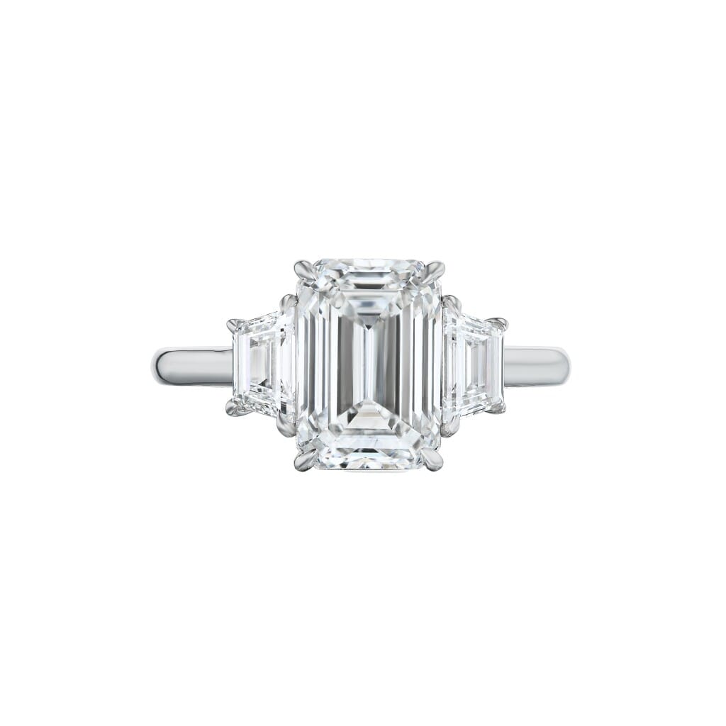 Platinum and 4.02ct Emerald Cut Diamond and Diamond Three Stone Engagement Ring