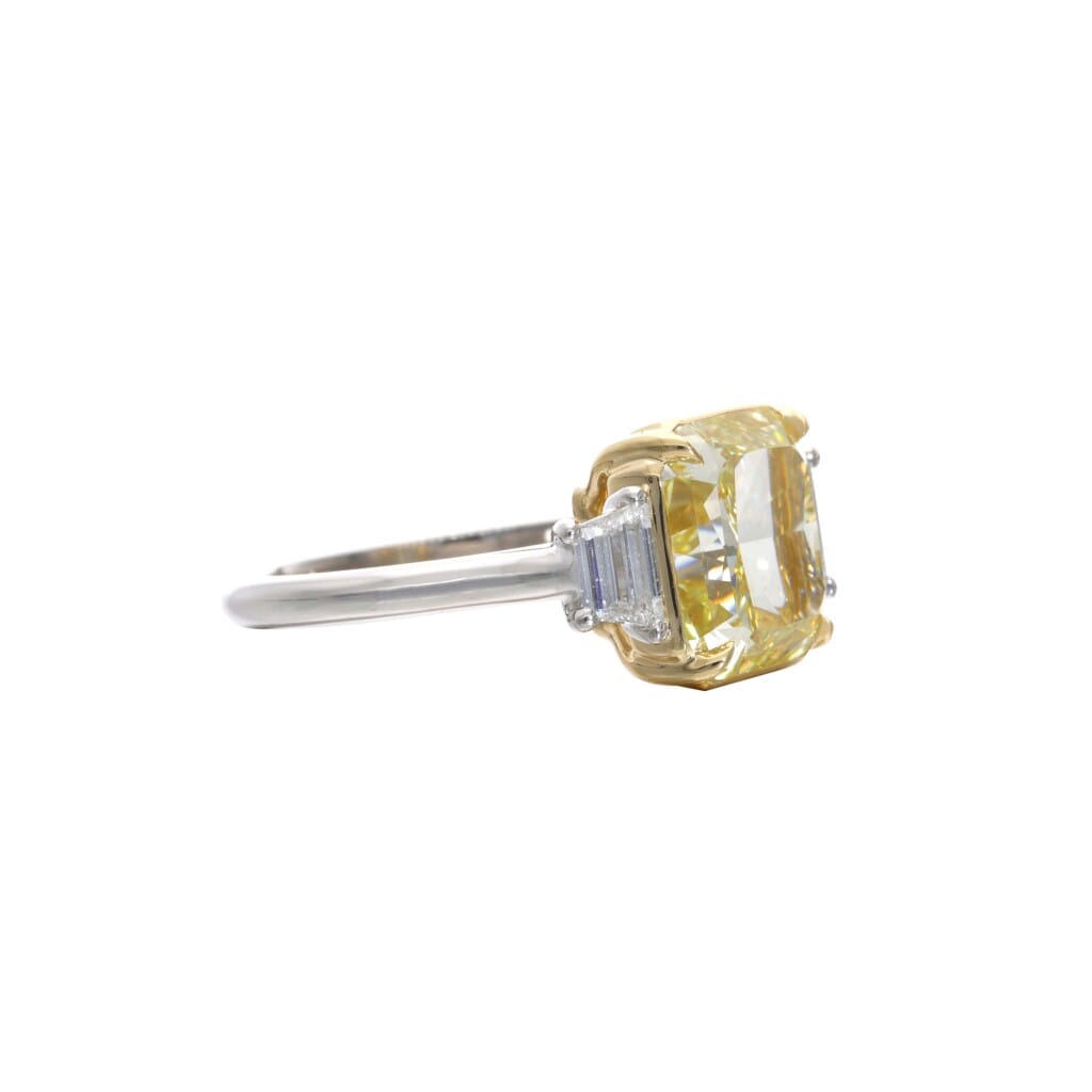 Platinum, Gold, 5.73ct Radiant Cut Fancy Intense Yellow Diamond and Diamond Engagement Ring