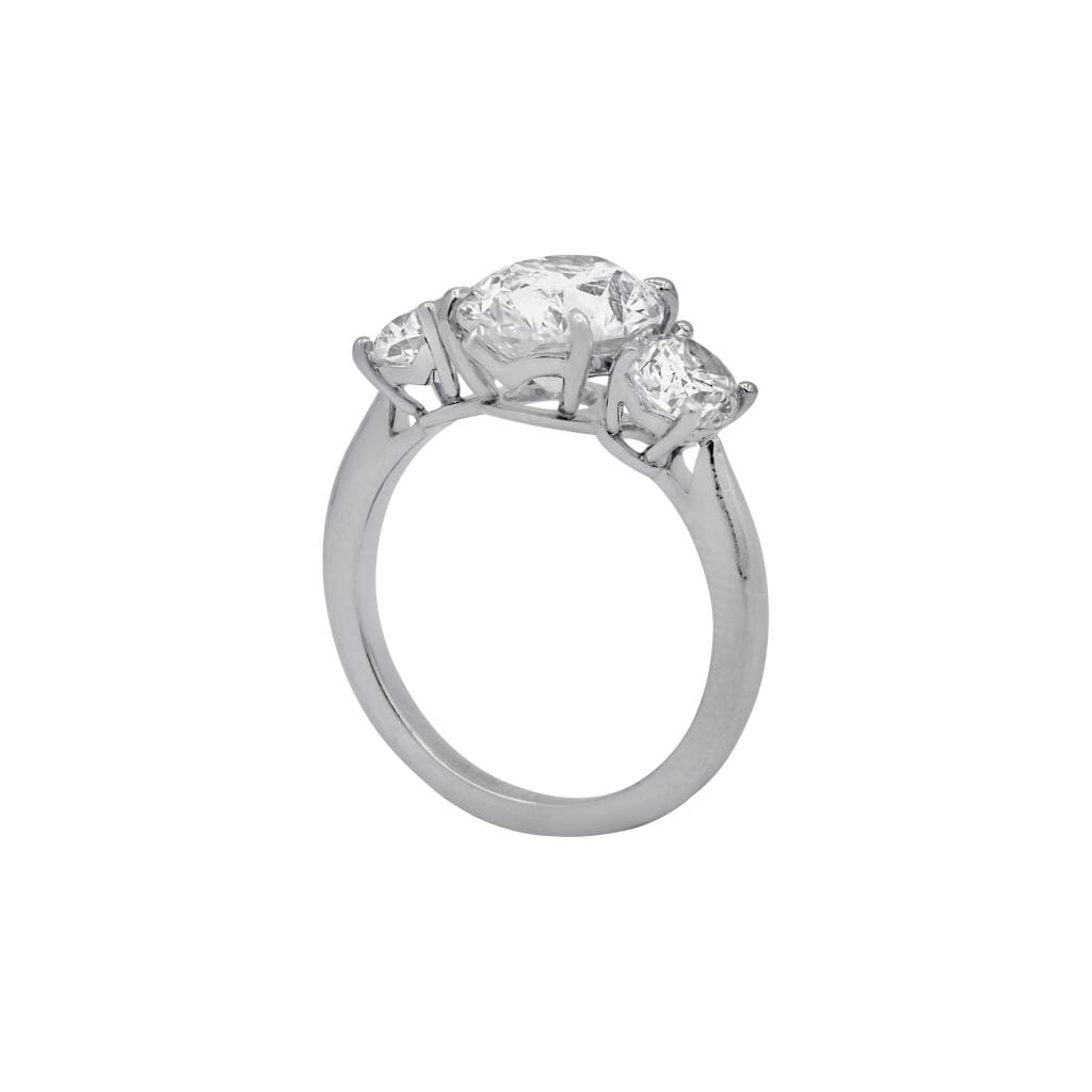 Platinum, 3.26ct Oval Cut Diamond and Diamond Three Stone Engagement Ring