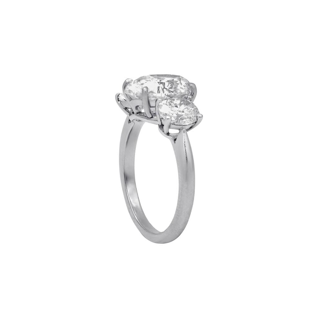 Platinum, 3.26ct Oval Cut Diamond and Diamond Three Stone Engagement Ring
