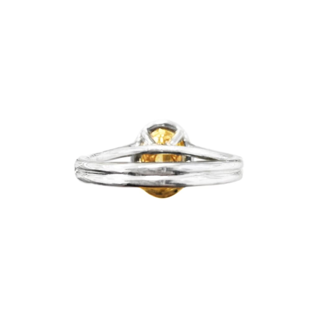 Platinum, Gold, 1.47ct Oval Cut Fancy Intense Yellow Diamond and Diamond Ring
