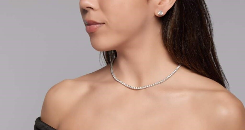 Platinum and 4.10ctw Round Brilliant Cut Diamond Stud Earrings