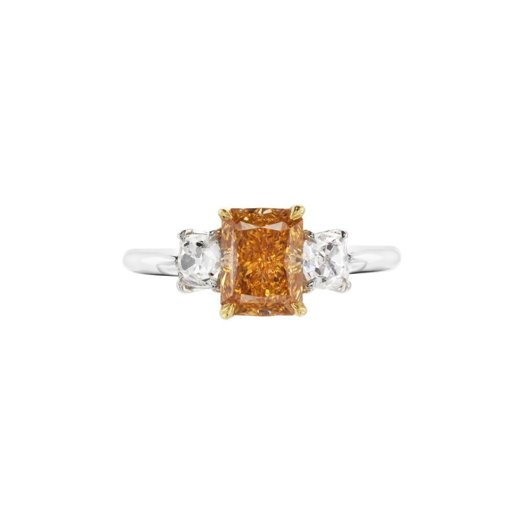 Platinum, Gold, 1.25ct Fancy Intense Yellowish Orange Diamond and Diamond Three Stone Engagement Ring