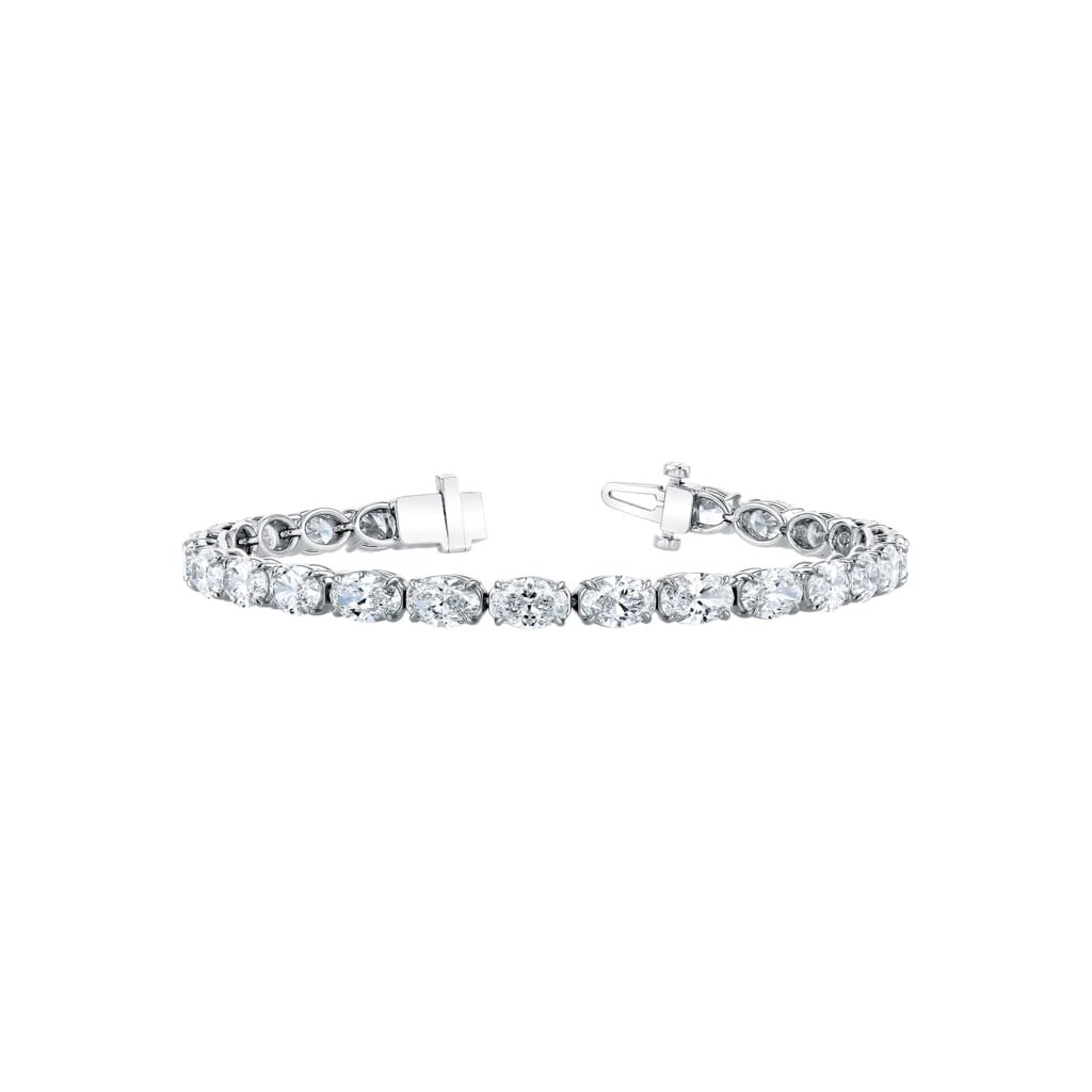 Platinum and 10.25ctw Oval Cut Diamond Tennis Bracelet