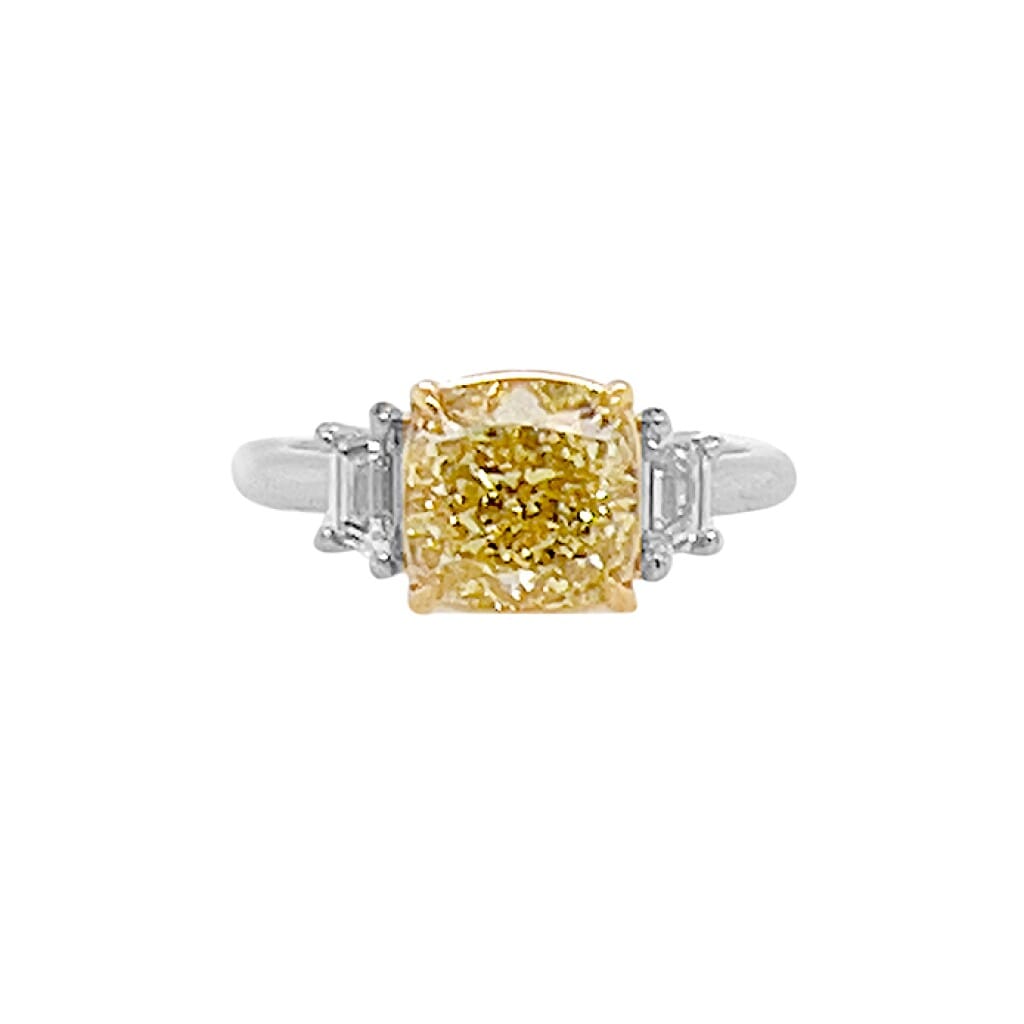 Platinum, Gold, 3.12ct Cushion Cut Fancy Yellow Diamond and Diamond Engagement Three Stone Ring