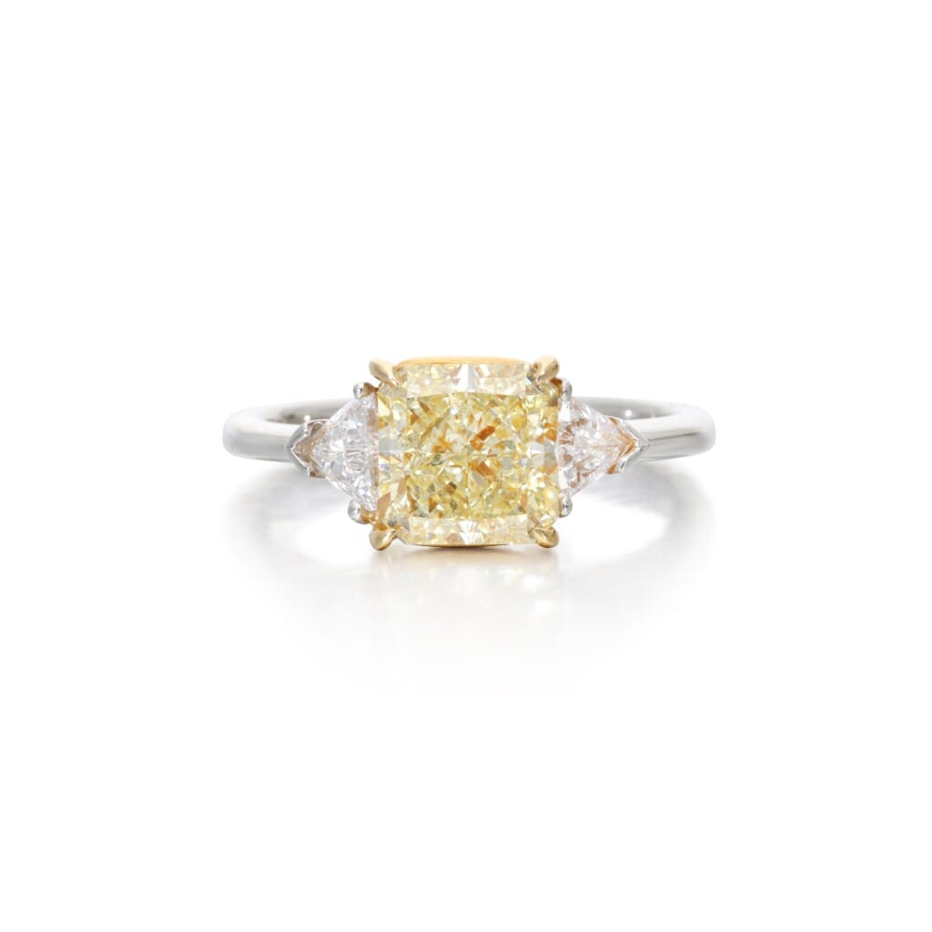 Platinum, Gold, 2.03ct Radiant Cut Fancy Yellow Diamond and Diamond Three Stone Ring