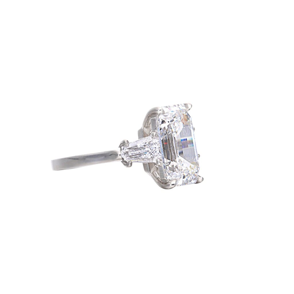 Platinum, 3.61ct Emerald Cut Diamond and Diamond Engagement Three Stone Ring
