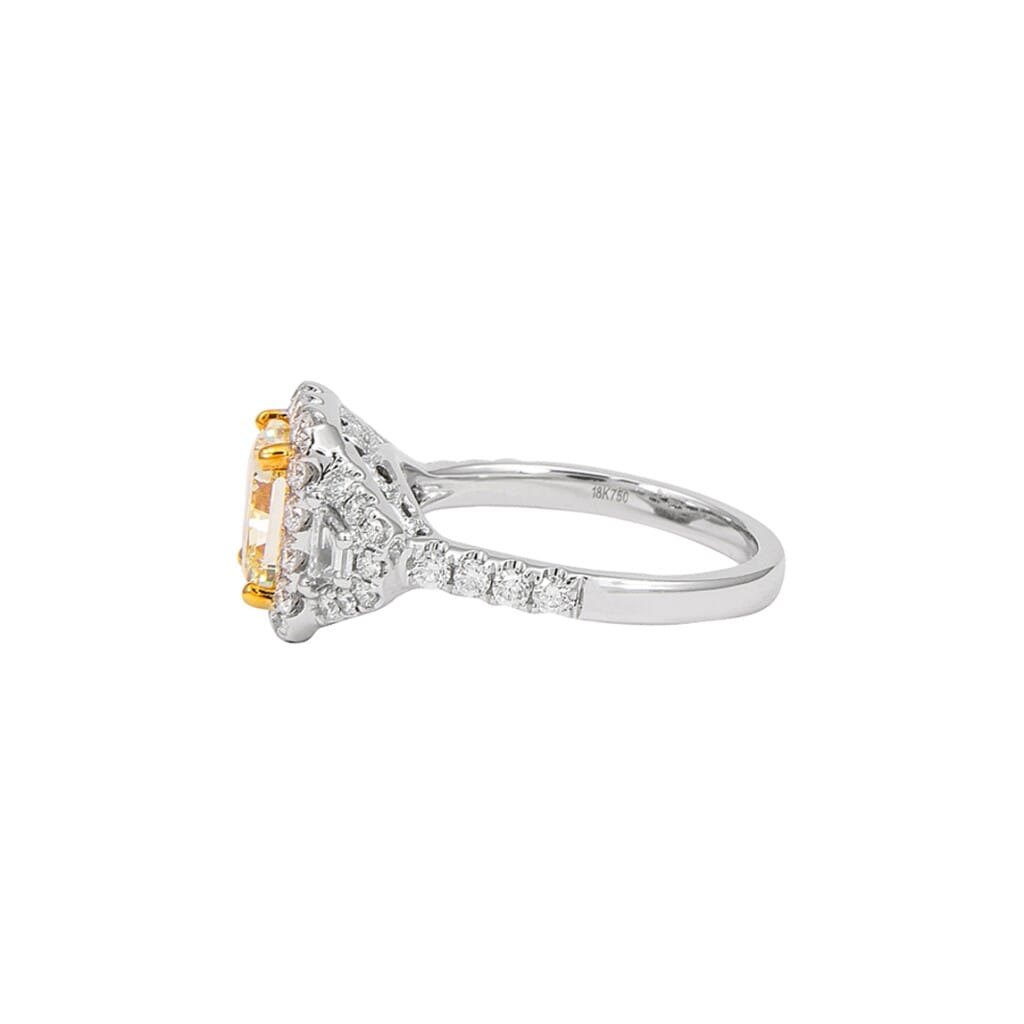 White Gold, Gold and 2.02ct Radiant Cut Fancy Yellow Diamond and Diamond Three Stone Ring
