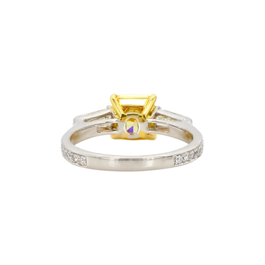 White Gold, 1.18ct Radiant Cut Fancy Vivid Yellow Diamond and Diamond Three Stone Engagement Ring