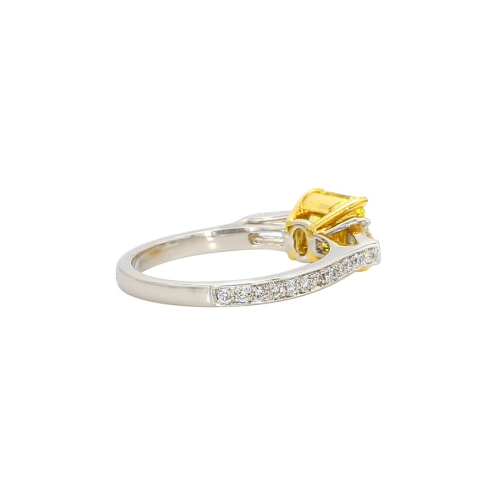 White Gold, 1.18ct Radiant Cut Fancy Vivid Yellow Diamond and Diamond Three Stone Engagement Ring