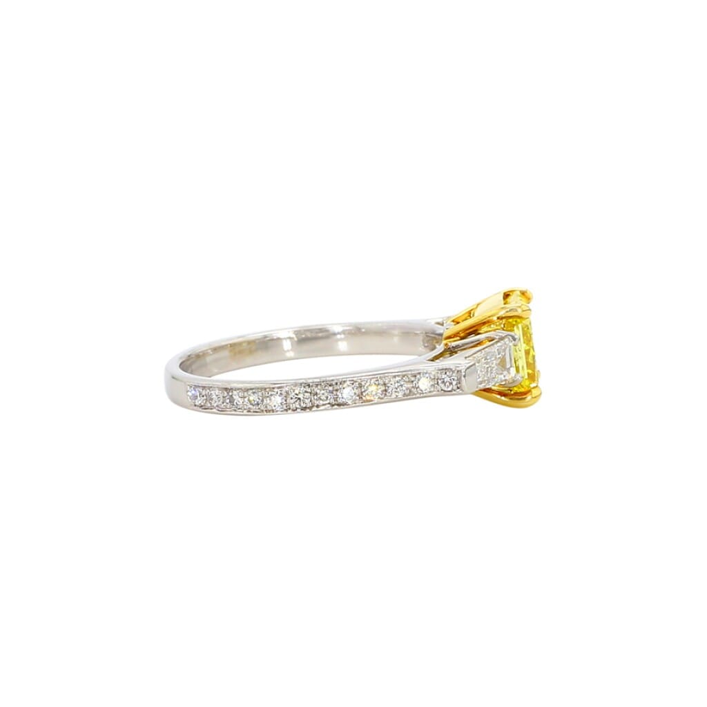 White Gold, 1.18ct Radiant Cut Fancy Vivid Yellow Diamond and Diamond Three Stone Engagement Ring