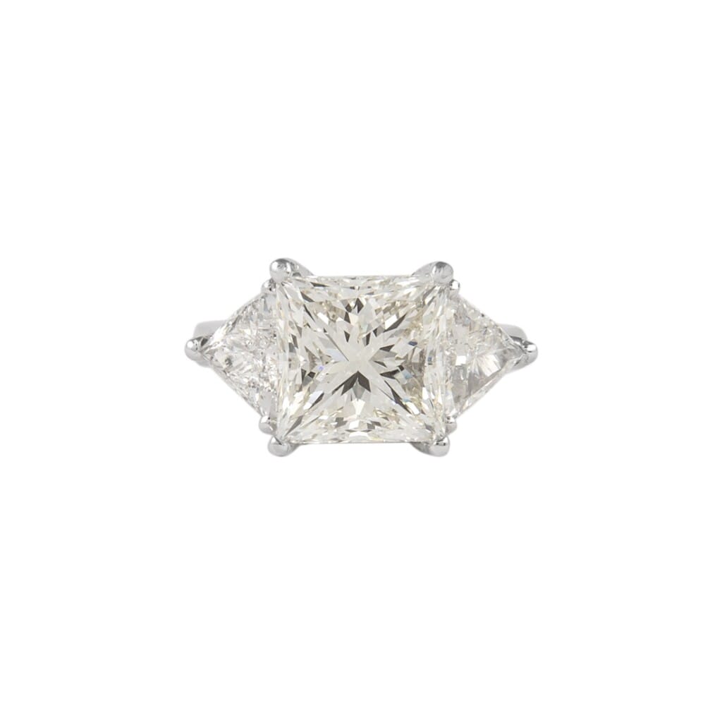 Platinum, 6.05ct Princess Cut Diamond and Diamond Three Stone Ring