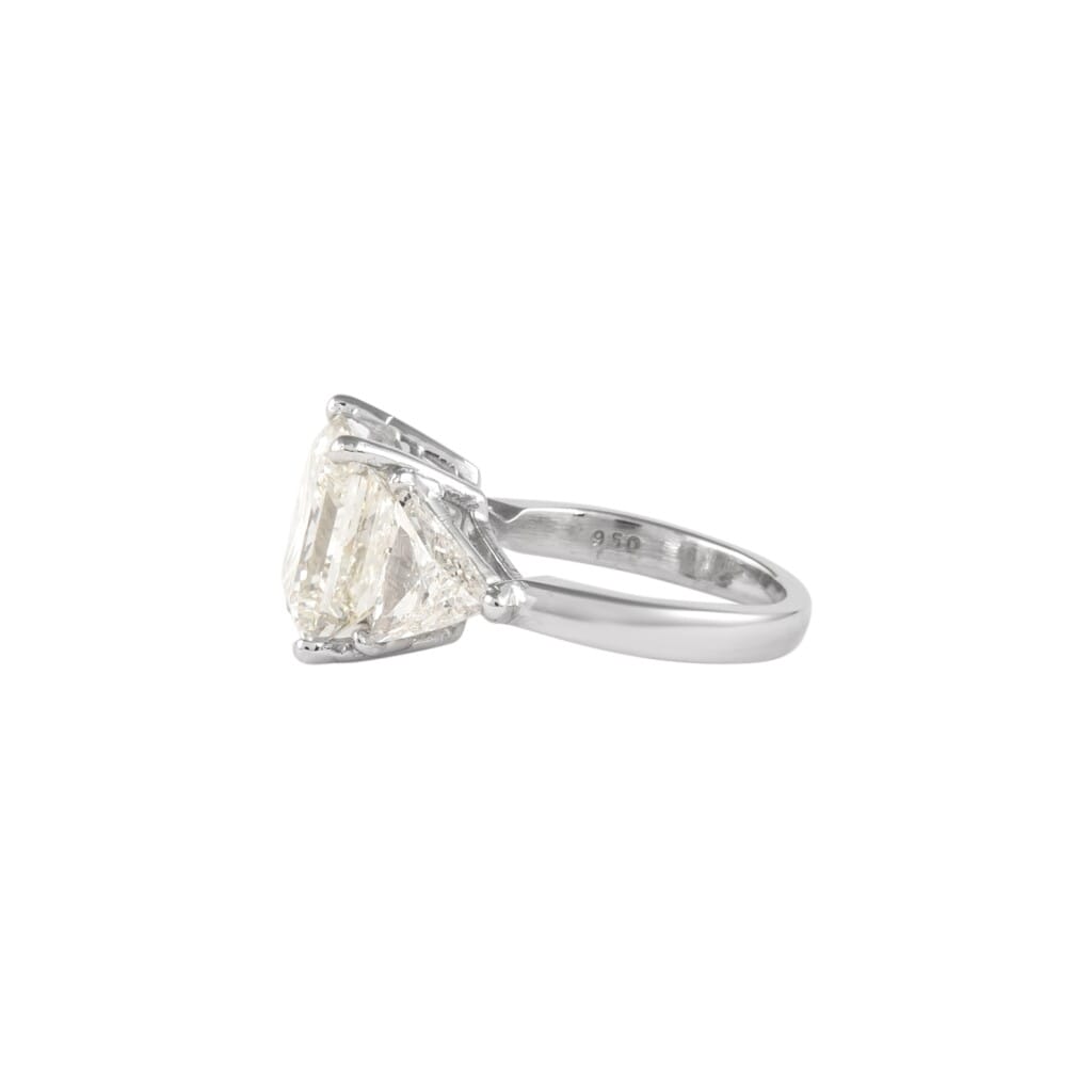 Platinum, 6.05ct Princess Cut Diamond and Diamond Three Stone Ring