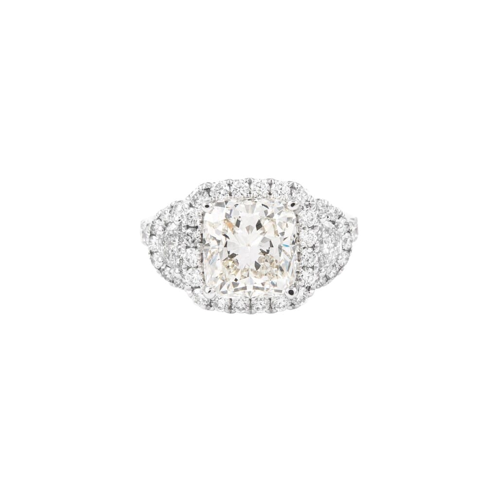 White Gold, 3.05ct Cushion Cut Diamond and Diamond Three Stone Ring