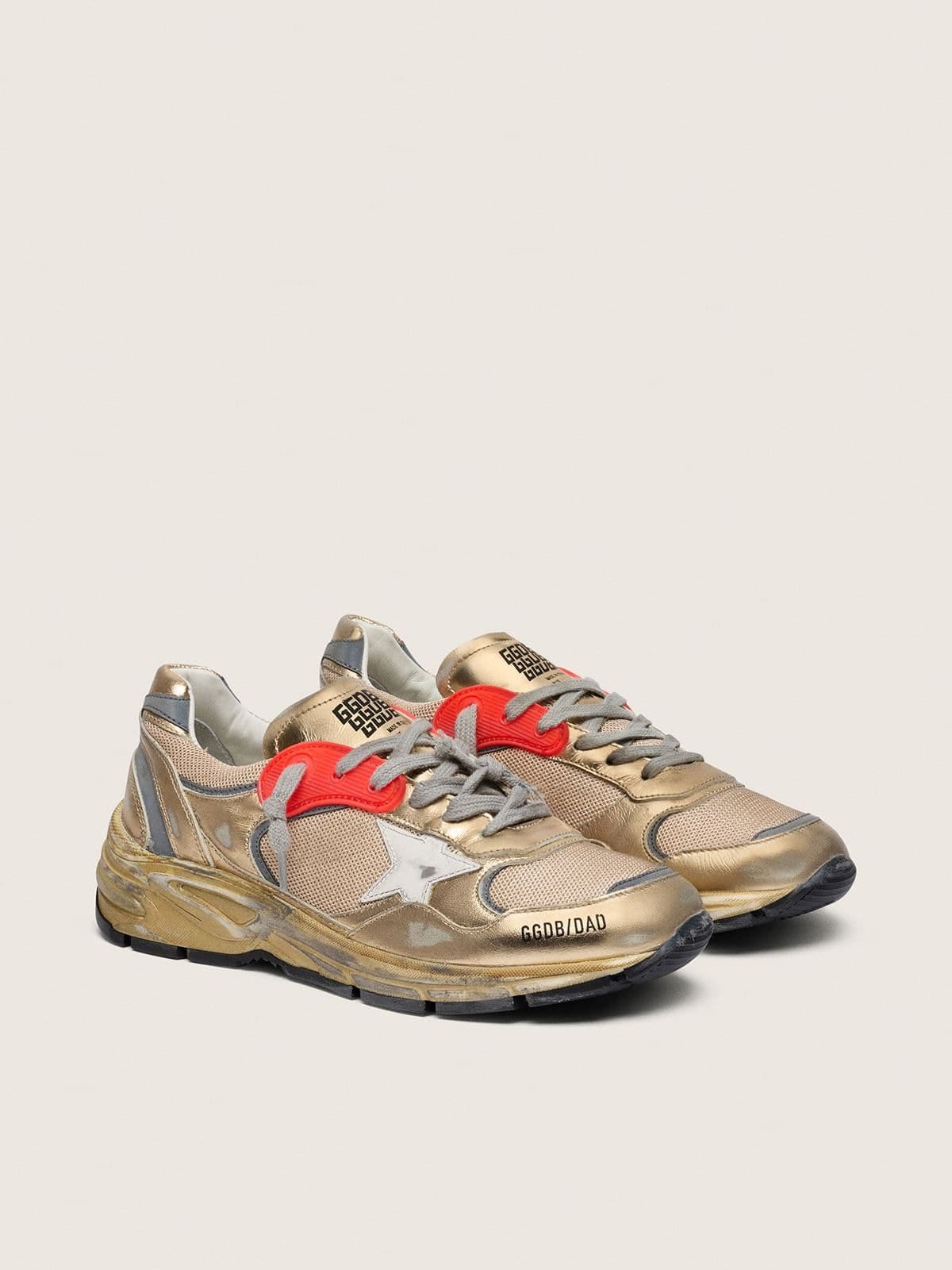 Golden Goose Mens Dad-Star In Gold Laminated Leather And Mesh With White Leather Star And Gold Leather Heel Tab Mens