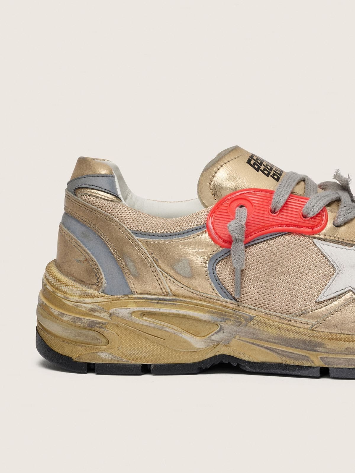 Golden Goose Mens Dad-Star In Gold Laminated Leather And Mesh With White Leather Star And Gold Leather Heel Tab Mens