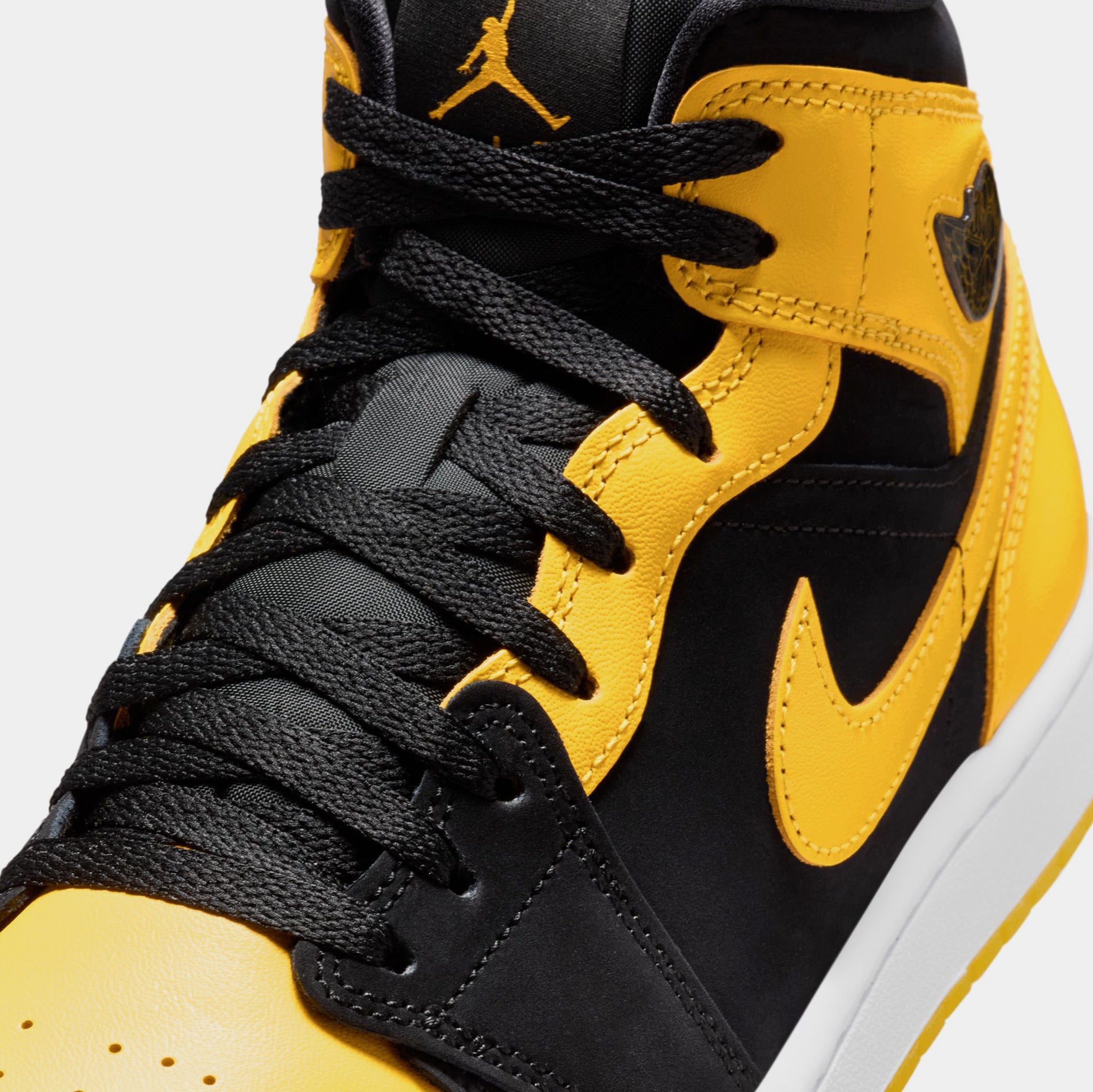 Air Jordan 1 Mid Mens Lifestyle Shoes (Black/Varsity Maize/White)