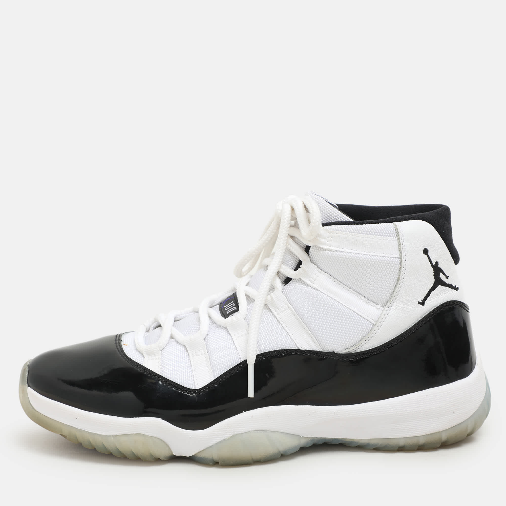 Air Jordan White/black Patent And Canvas Jordan - 11 - Retro High Top Sneakers