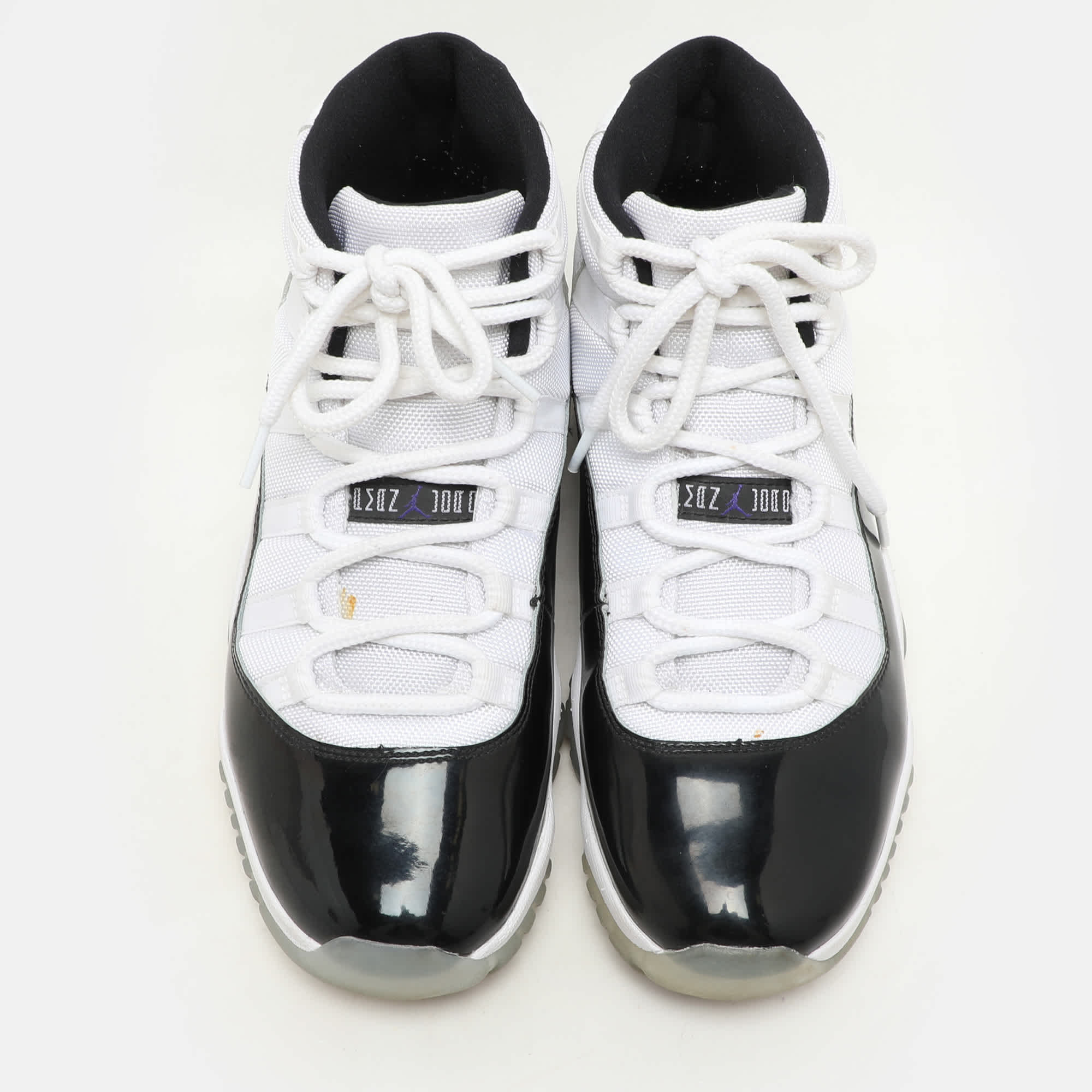 Air Jordan White/black Patent And Canvas Jordan - 11 - Retro High Top Sneakers