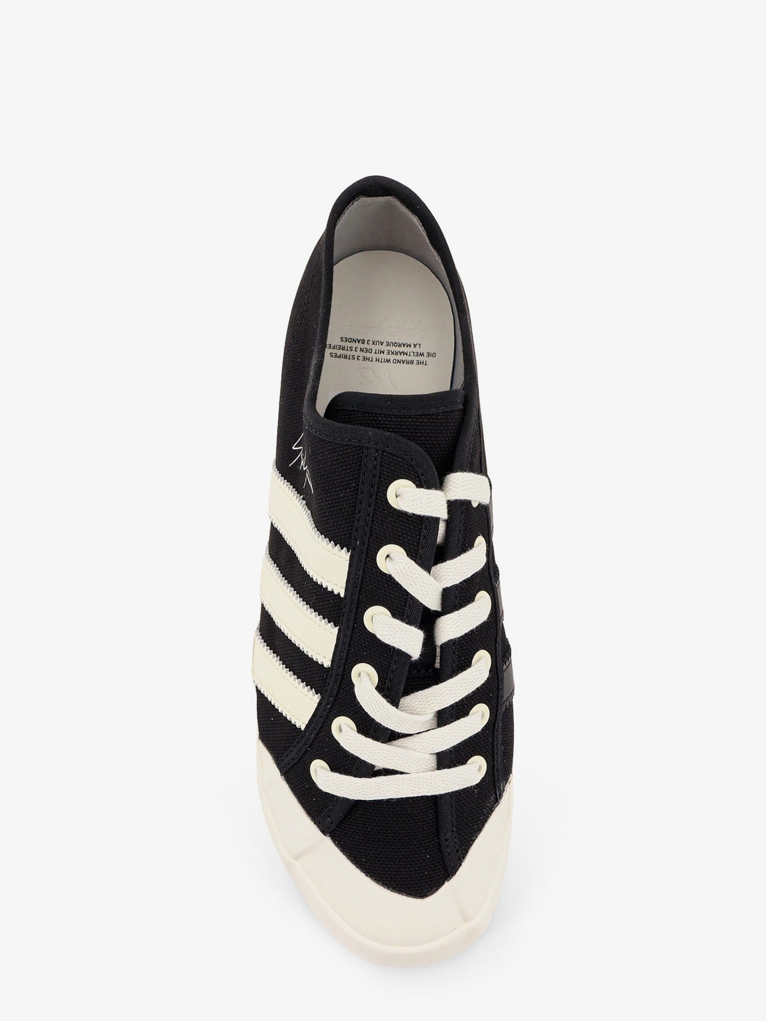adidas Canvas sneakers with iconic side stripes
