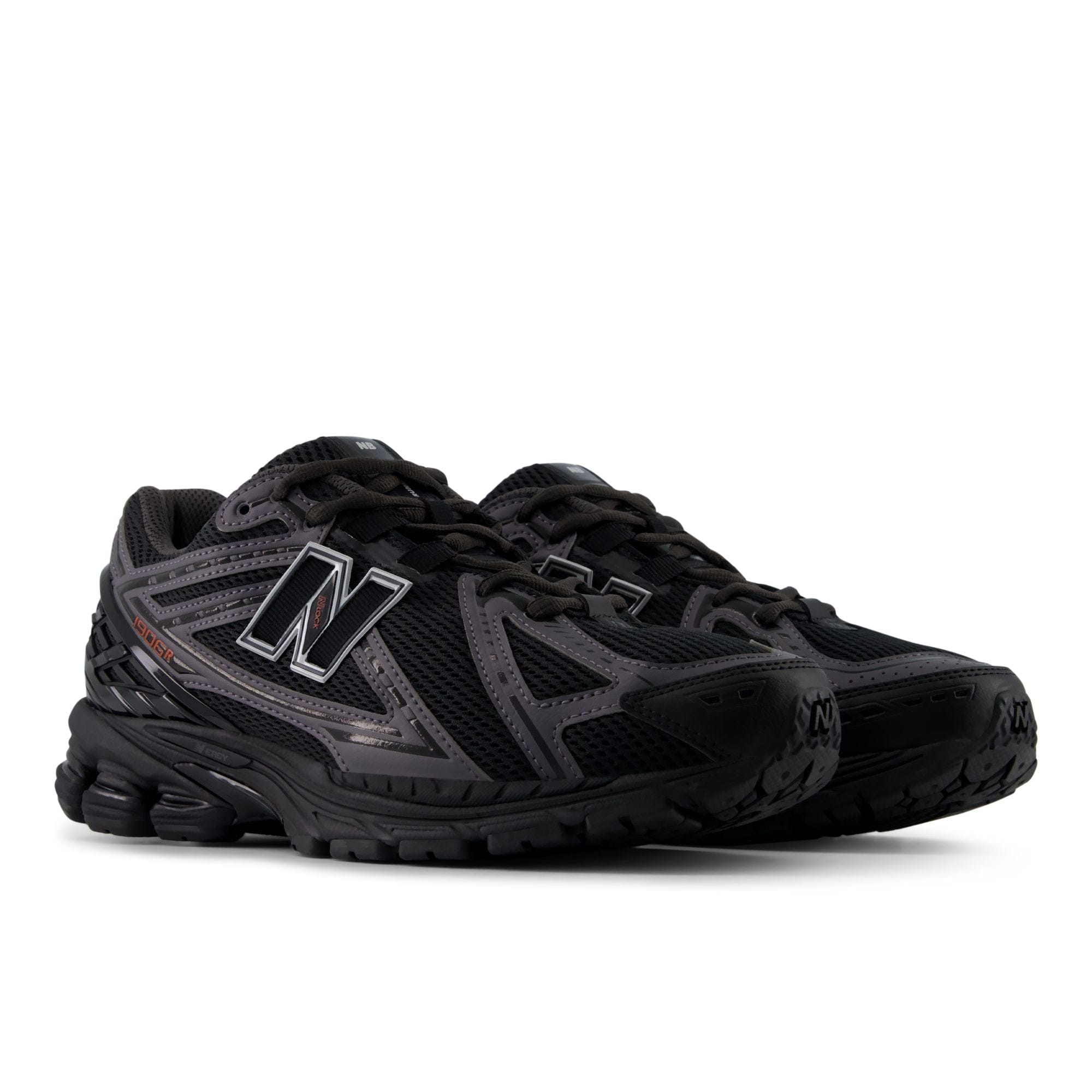 New Balance 1906R – Black with Hot Tomato