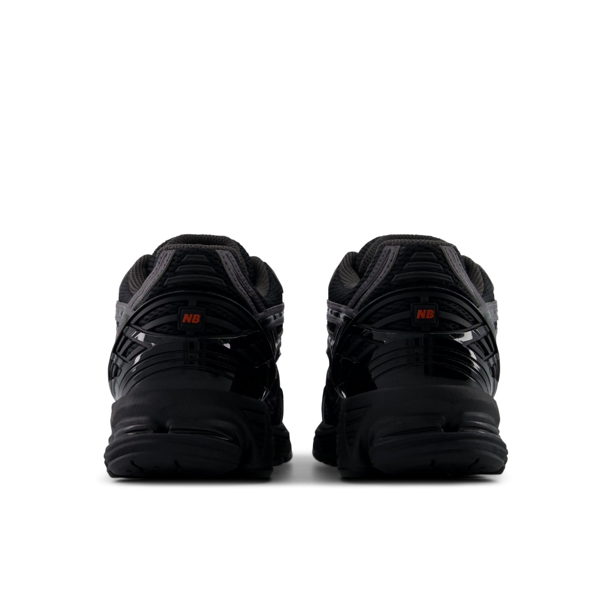 New Balance 1906R – Black with Hot Tomato