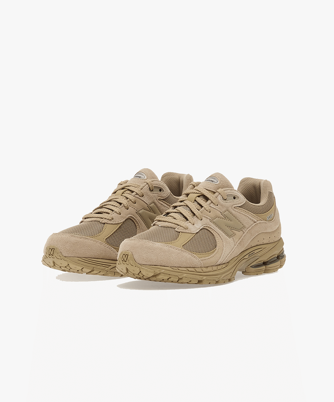 New Balance | 2002R { STONEWARE WITH SILVER METALLIC