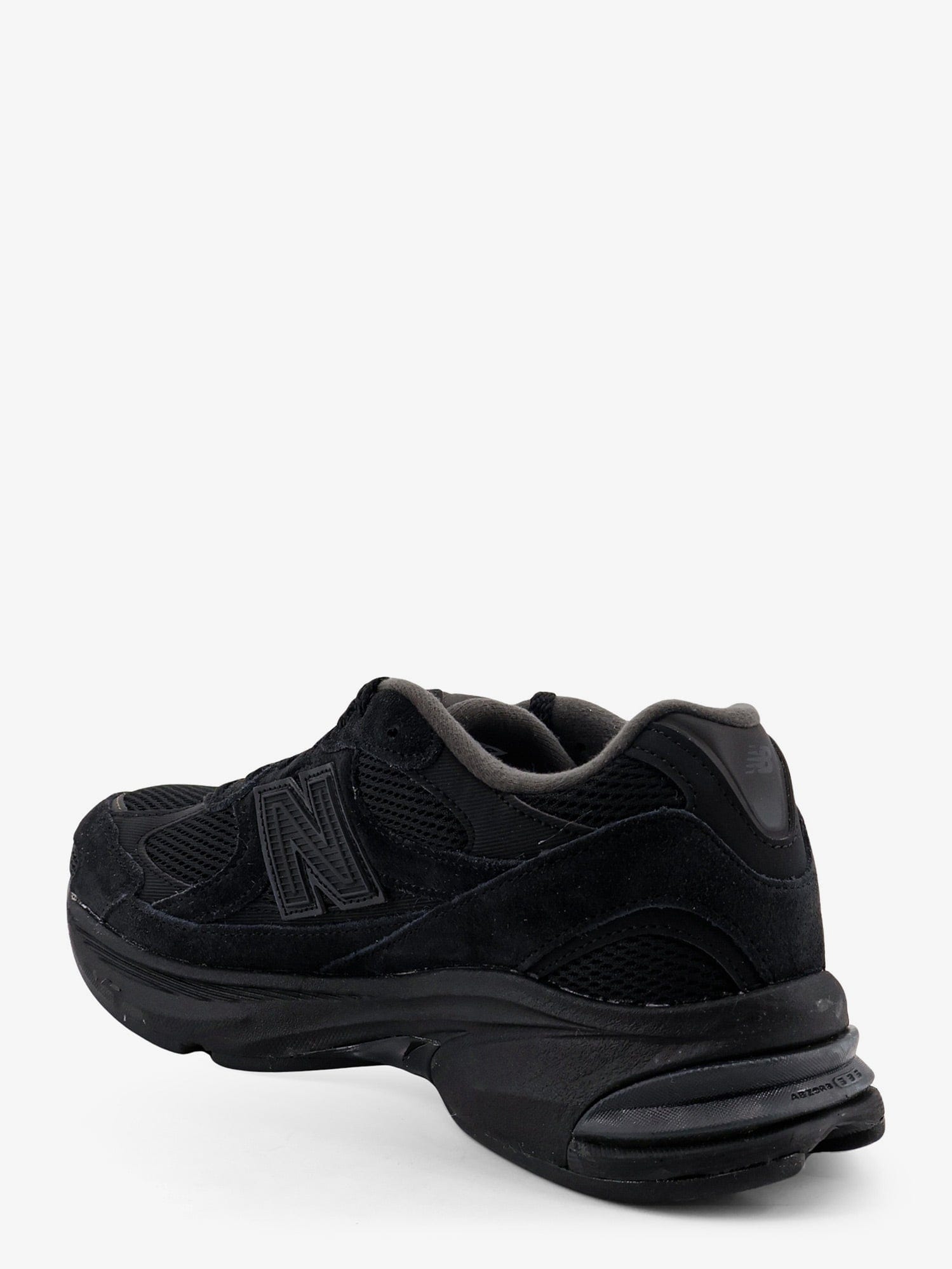 New Balance U2010 sneakers in mesh and suede with iconic side logo