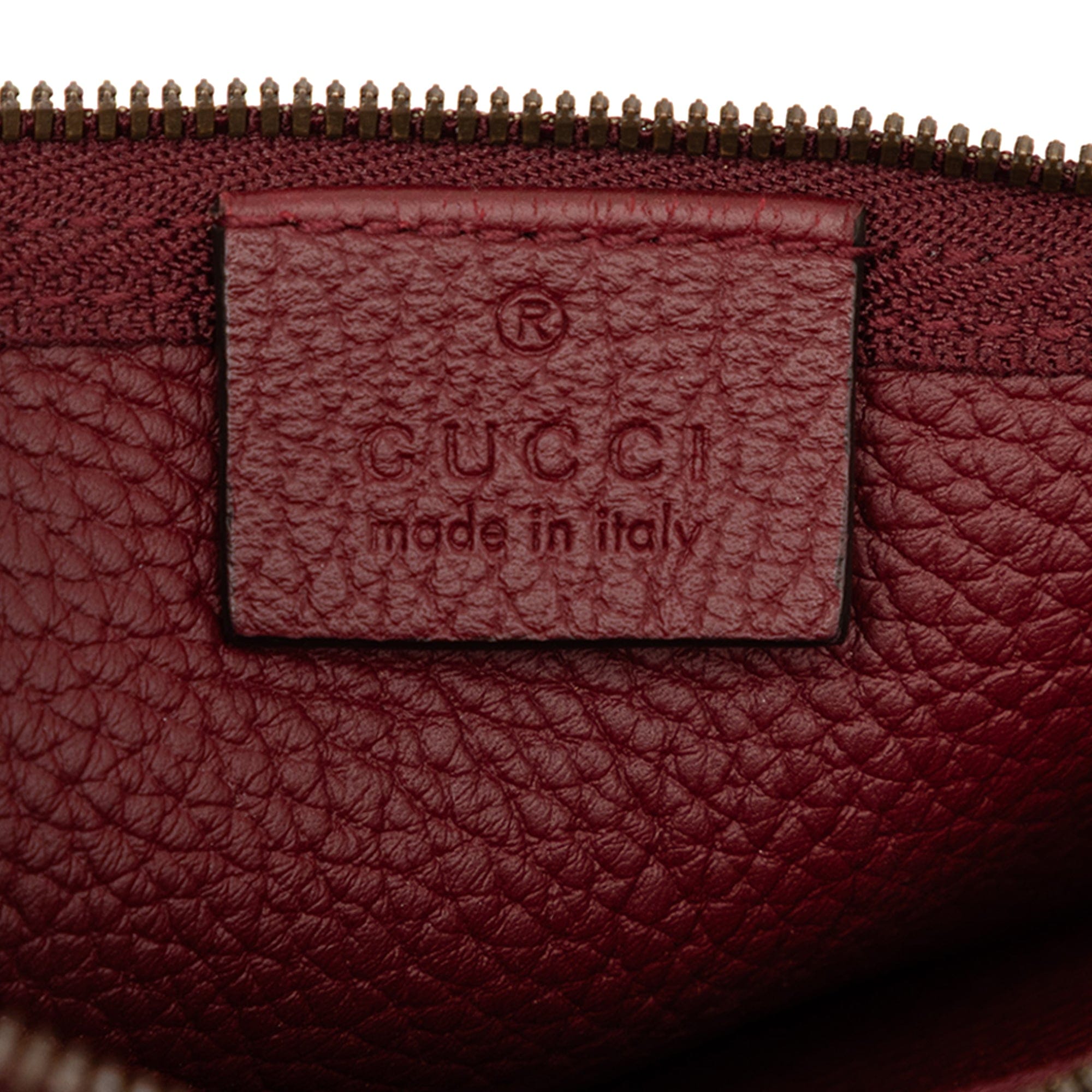 Gucci Grained Leather Vertical Zip Sling Bag