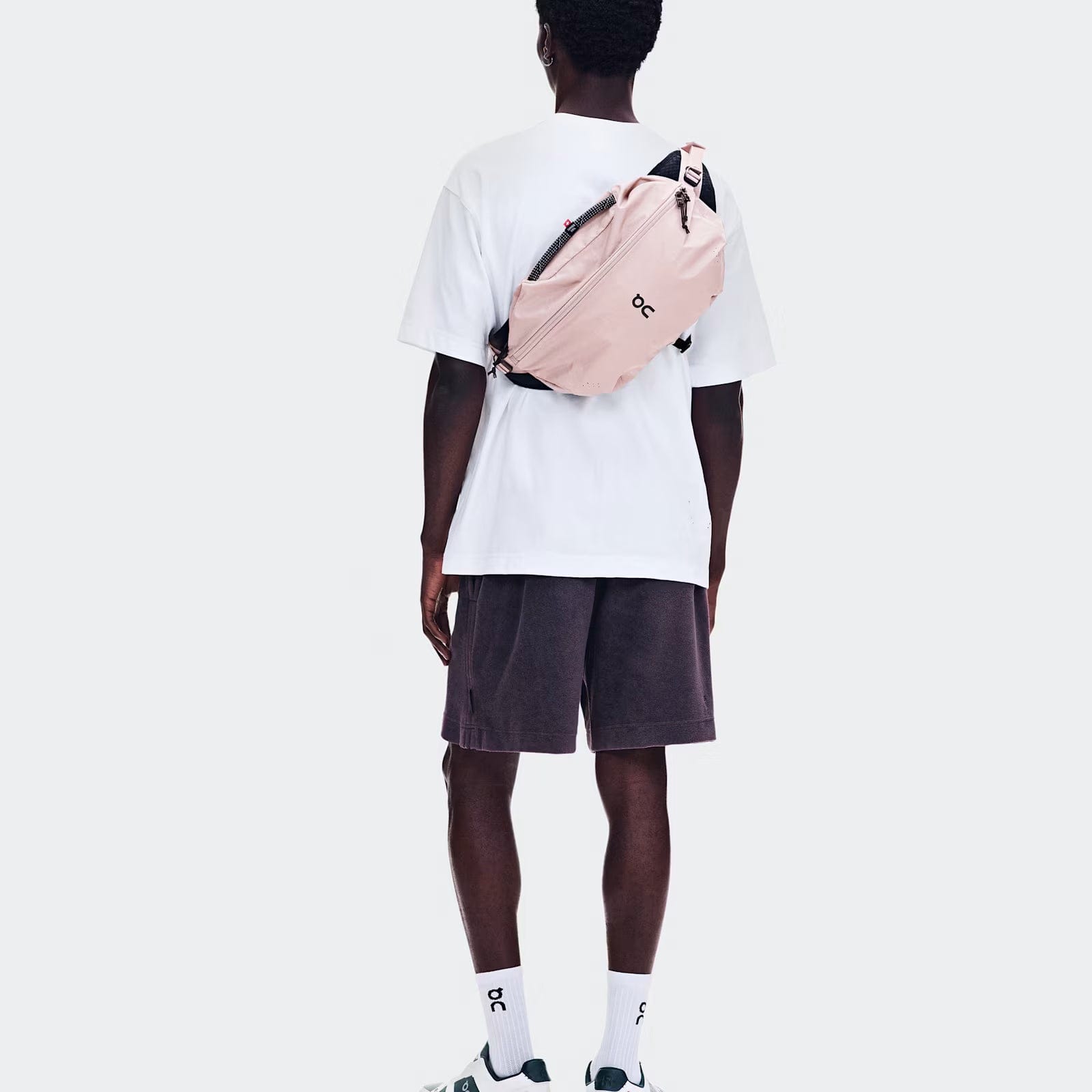 On Running On Sling Pack 9 l Biscuit | Black