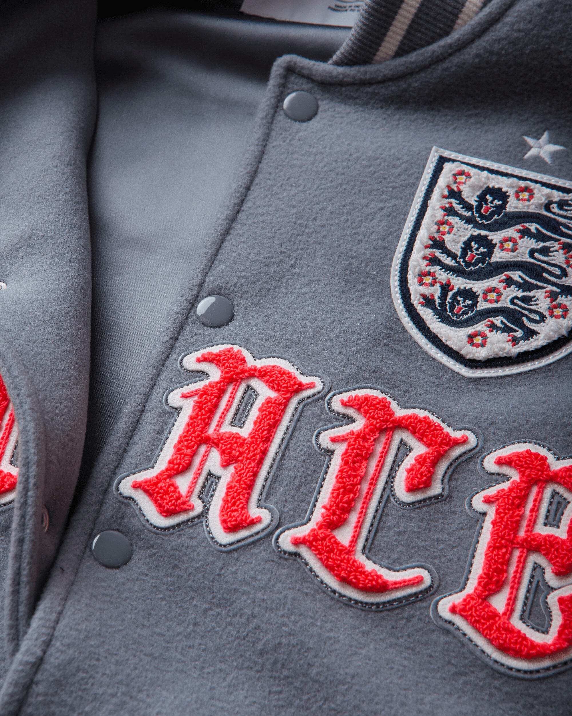 Nike England x Palace Varsity Jacket Cool Grey / White / Bright Crimson