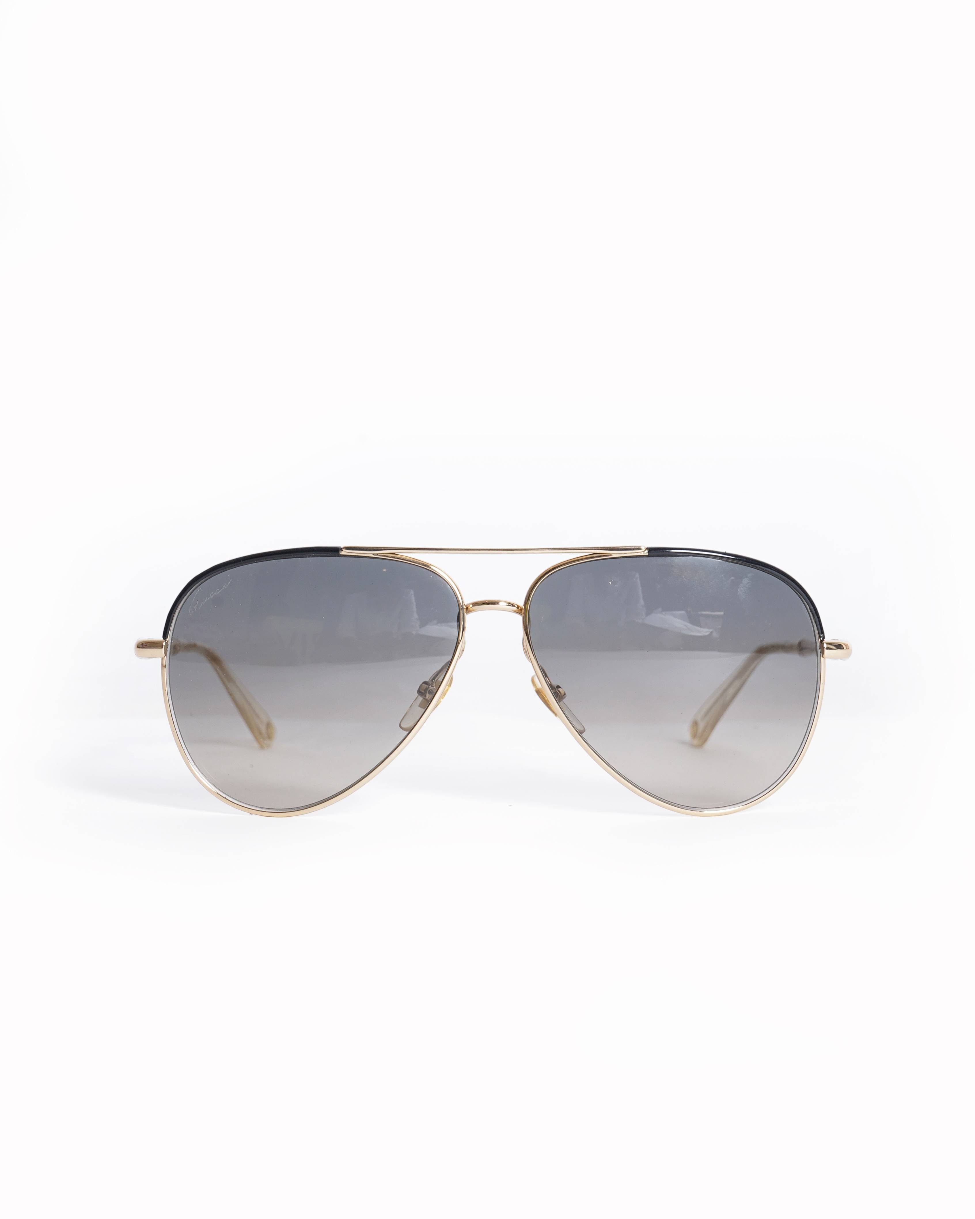 Gucci New Gucci men's sunglasses in gold/black frame