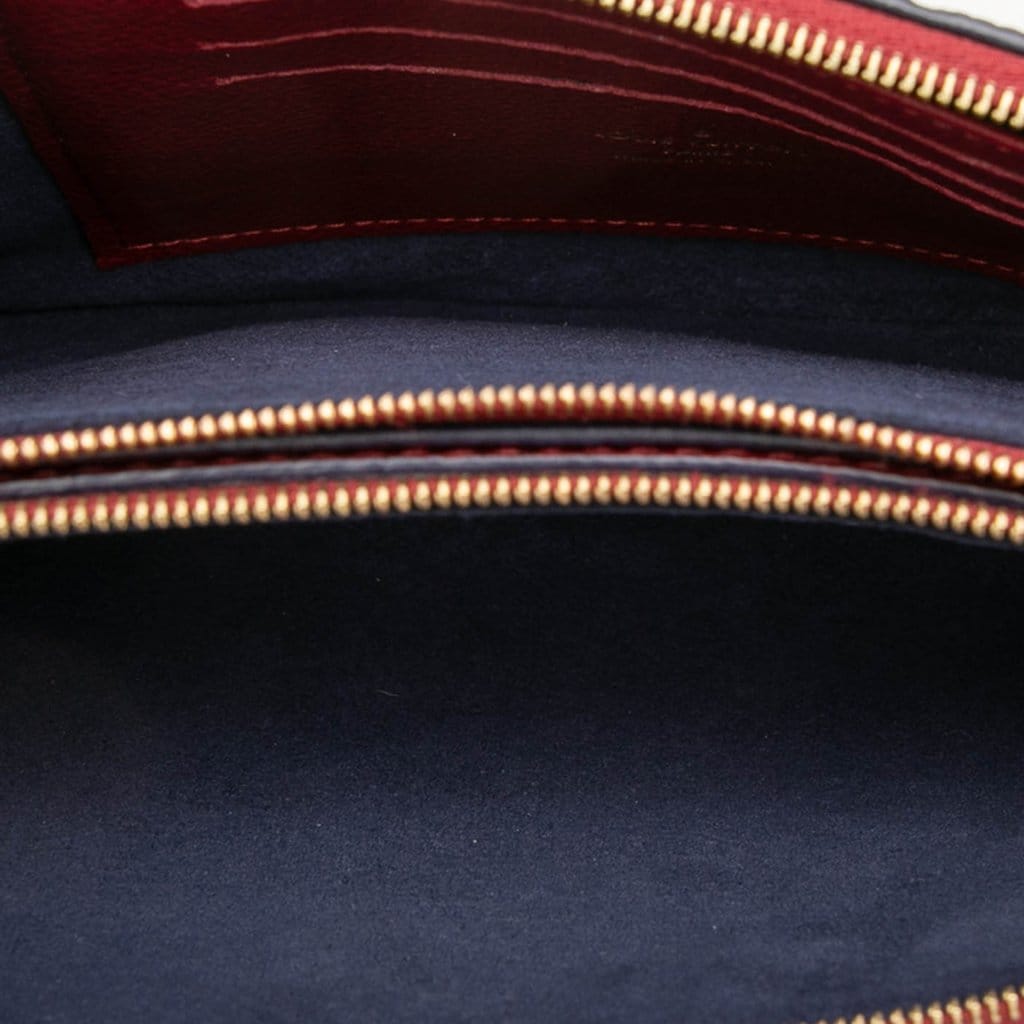 Louis Vuitton Monogram Empreinte Double Zip Pochette