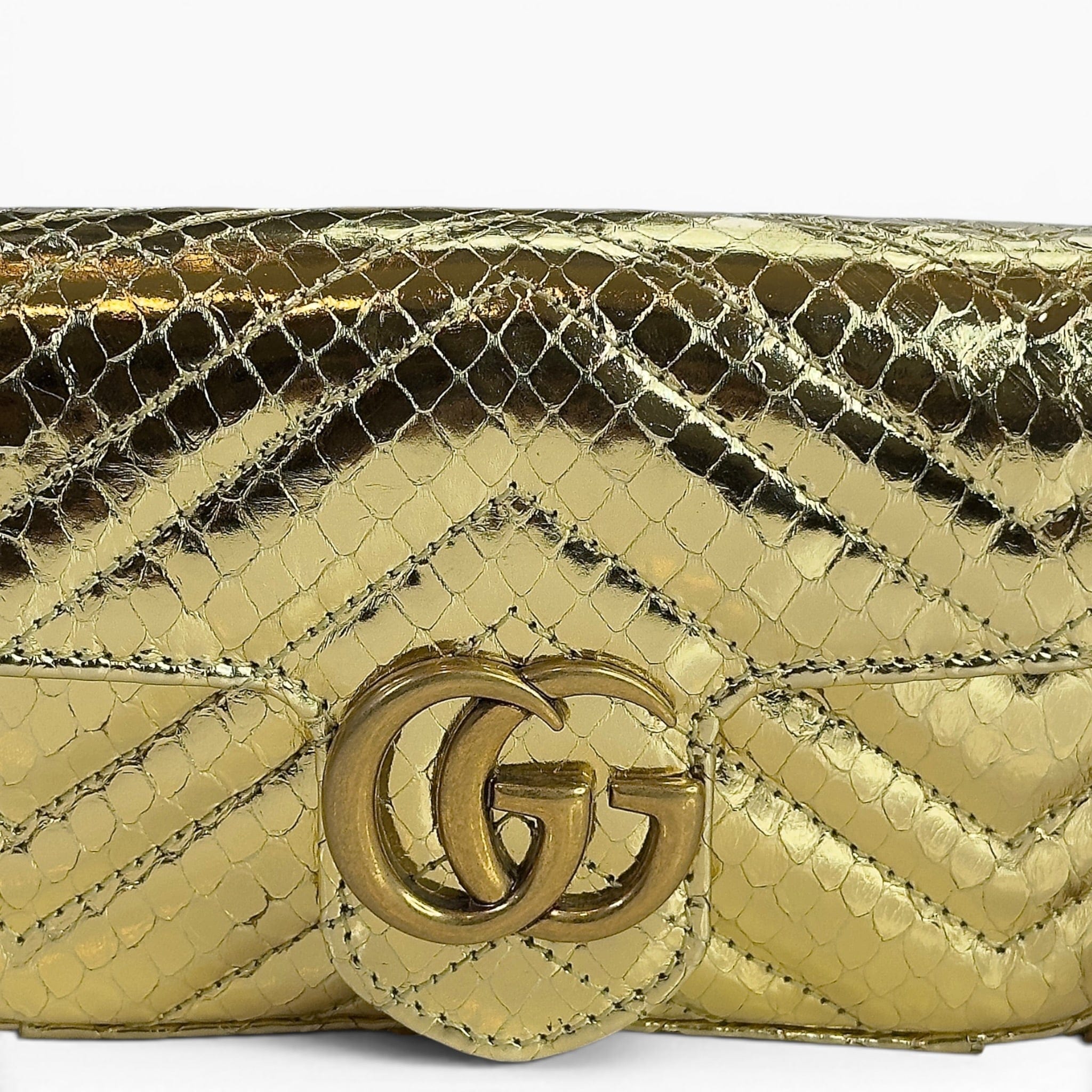 Gucci GG Marmont metallic gold leather mini shoulder bag