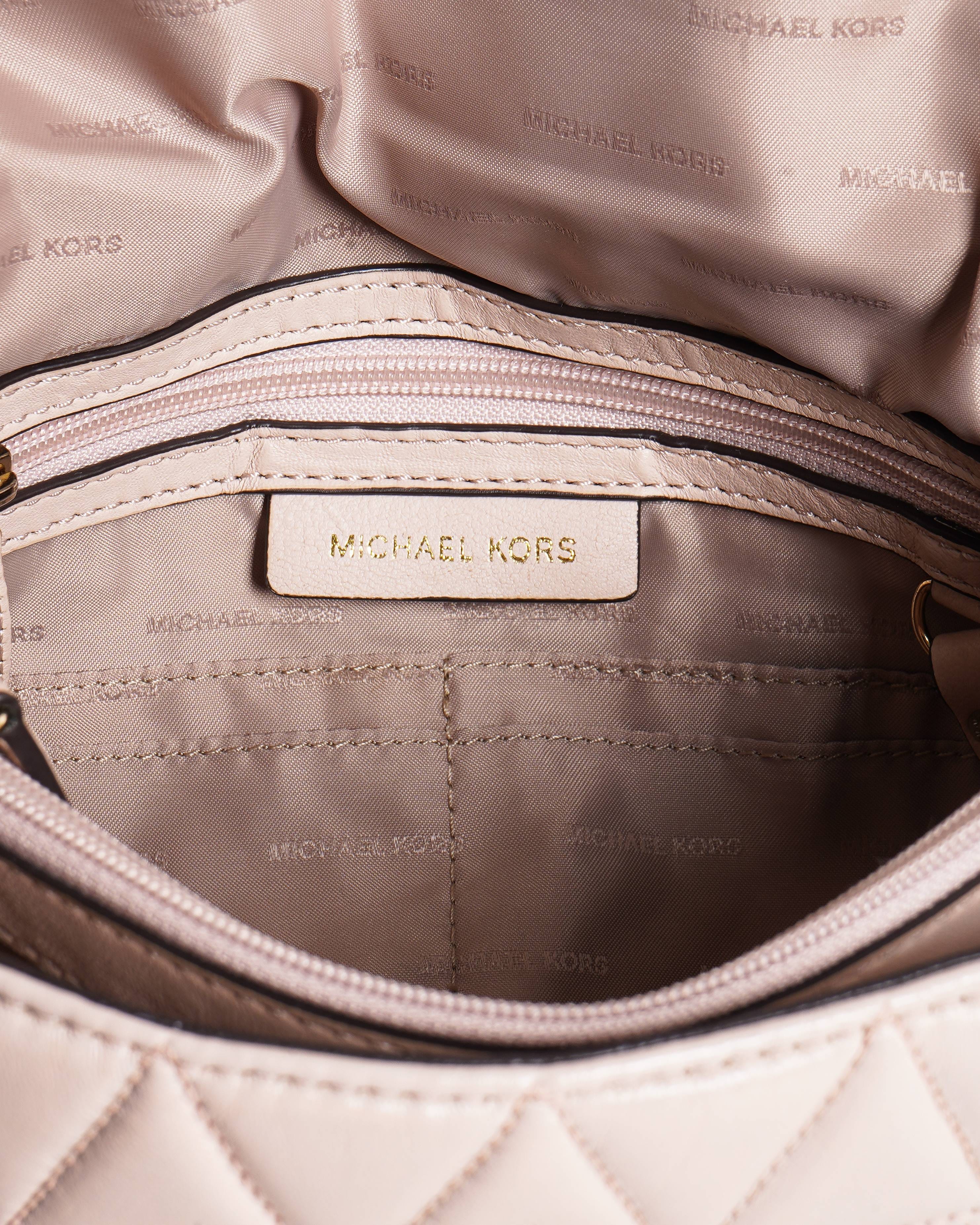 Michael Kors pink quilted shoulder bag