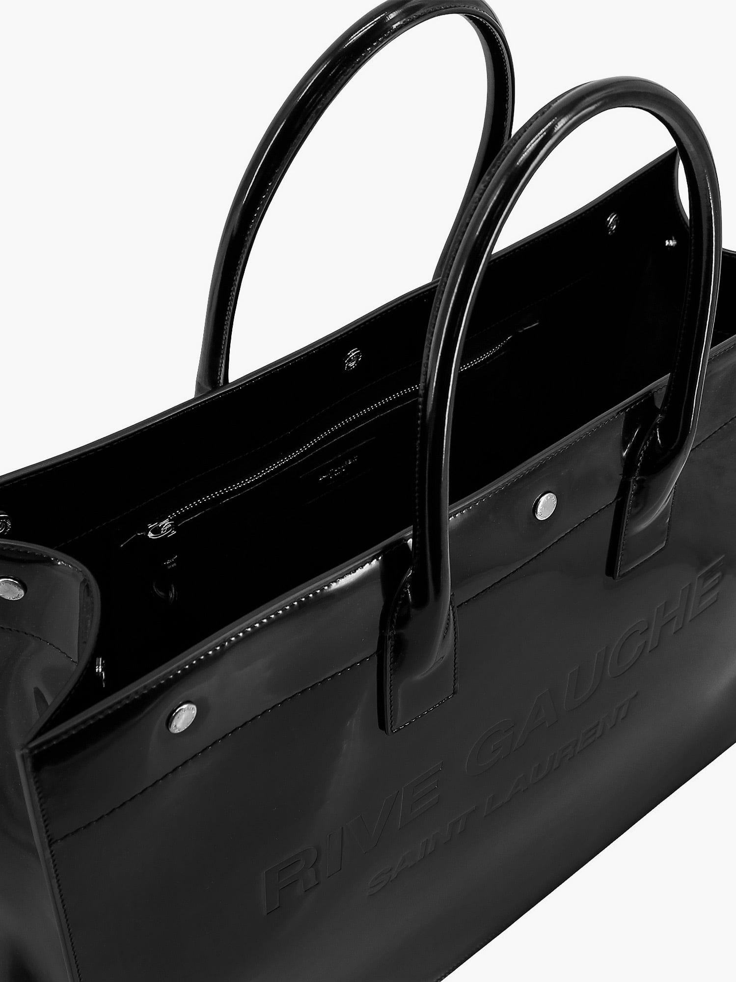 Saint Laurent Patent leather handbag with embossed logo