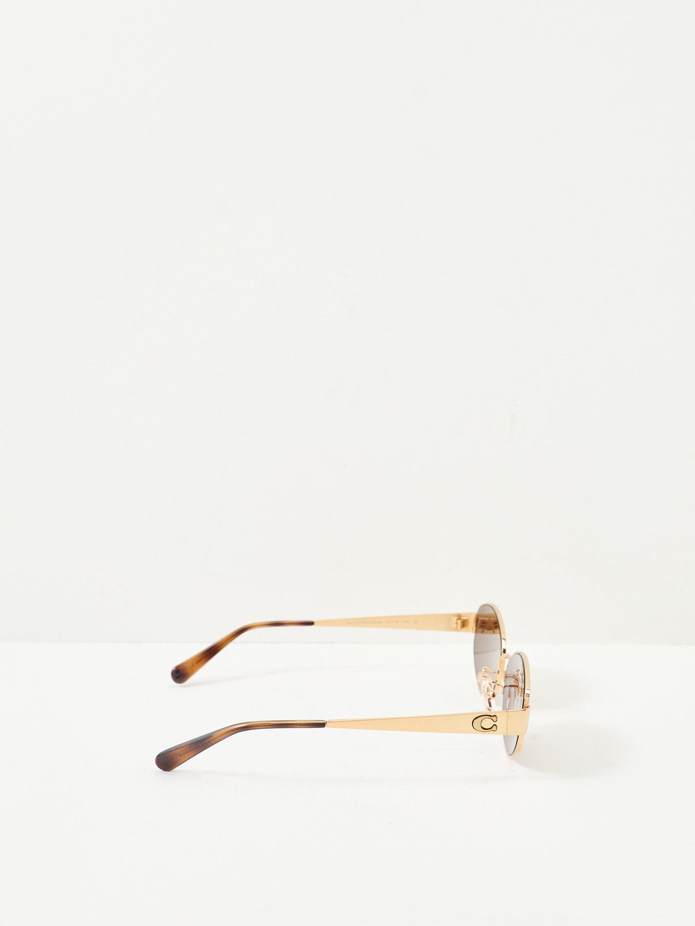 Coach 0HC7192D Round Sunglasses Gold