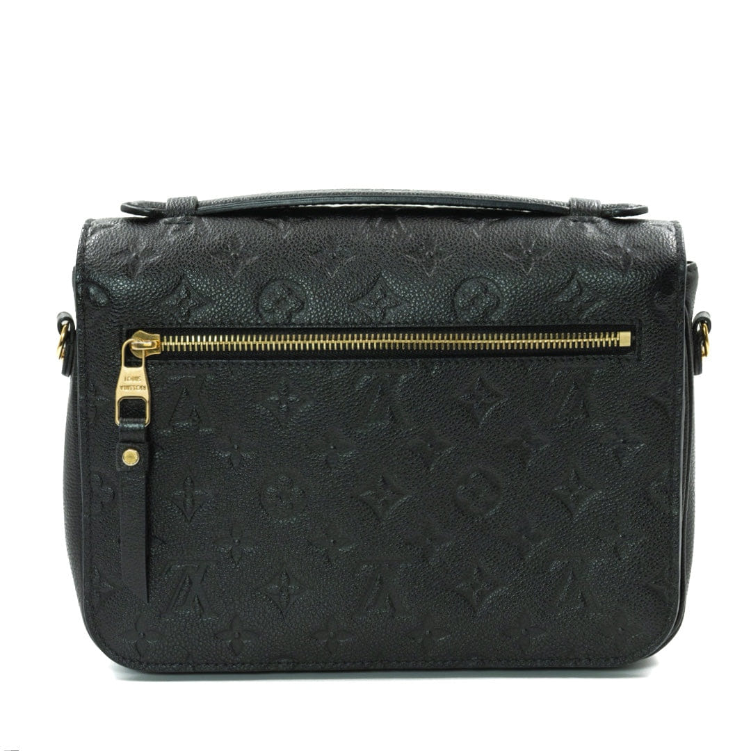 Louis Vuitton Pochette Metis bag in black Monogram Empreinte leather with gold - tone hardware