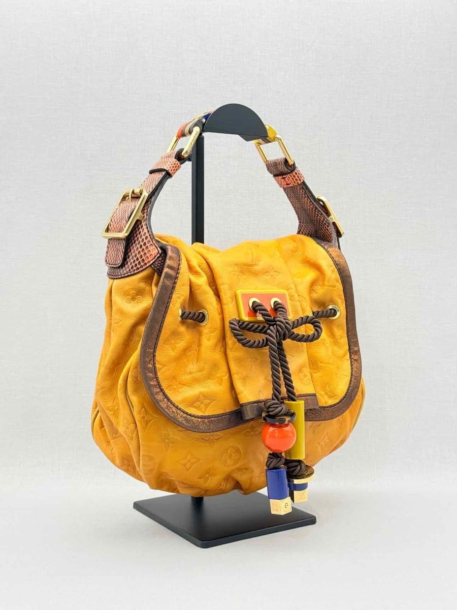 Louis Vuitton Kalahari Mustard Hobo bag