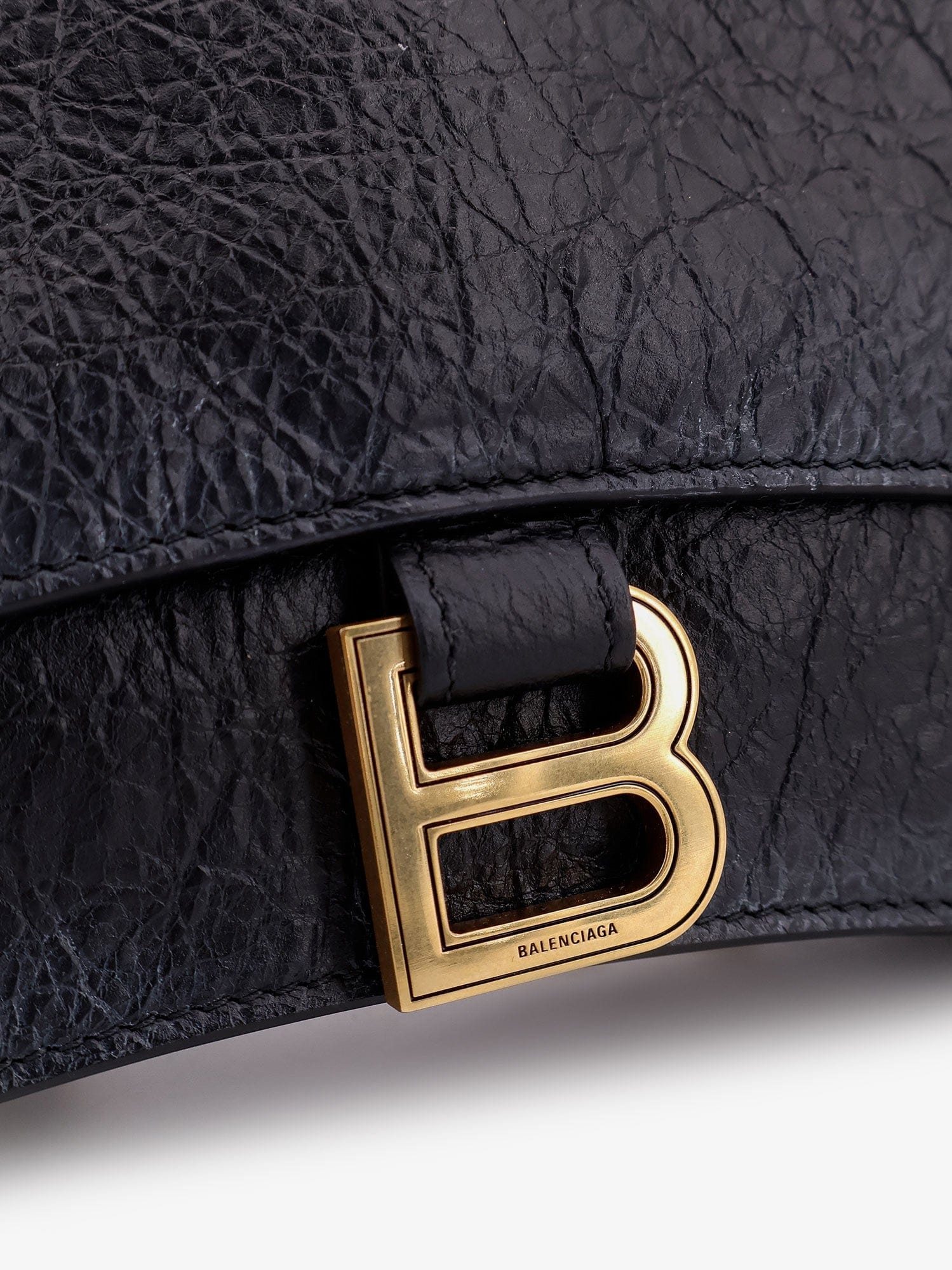 Balenciaga Leather shoulder bag with dirty effect and iconic metal logo