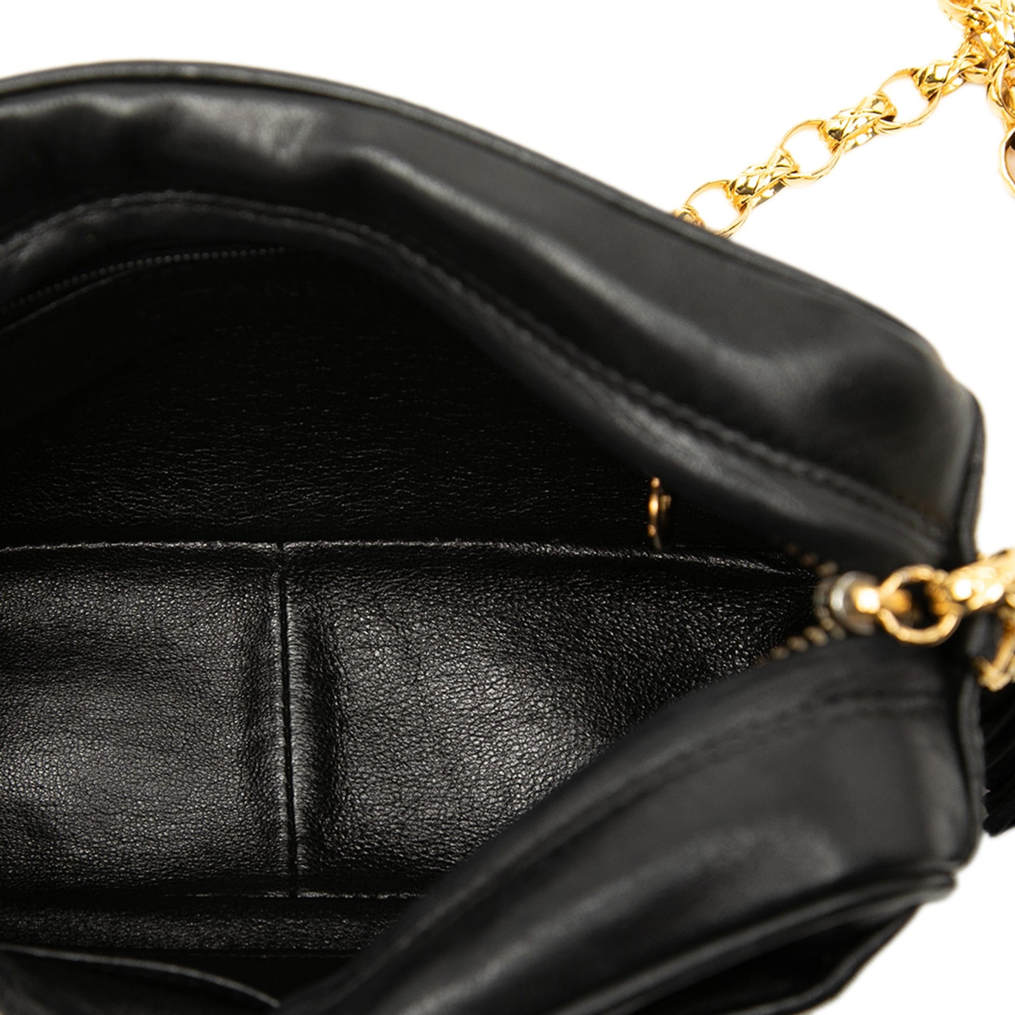 Chanel CC Vertical Quilted Lambskin Tassel Camera Bag