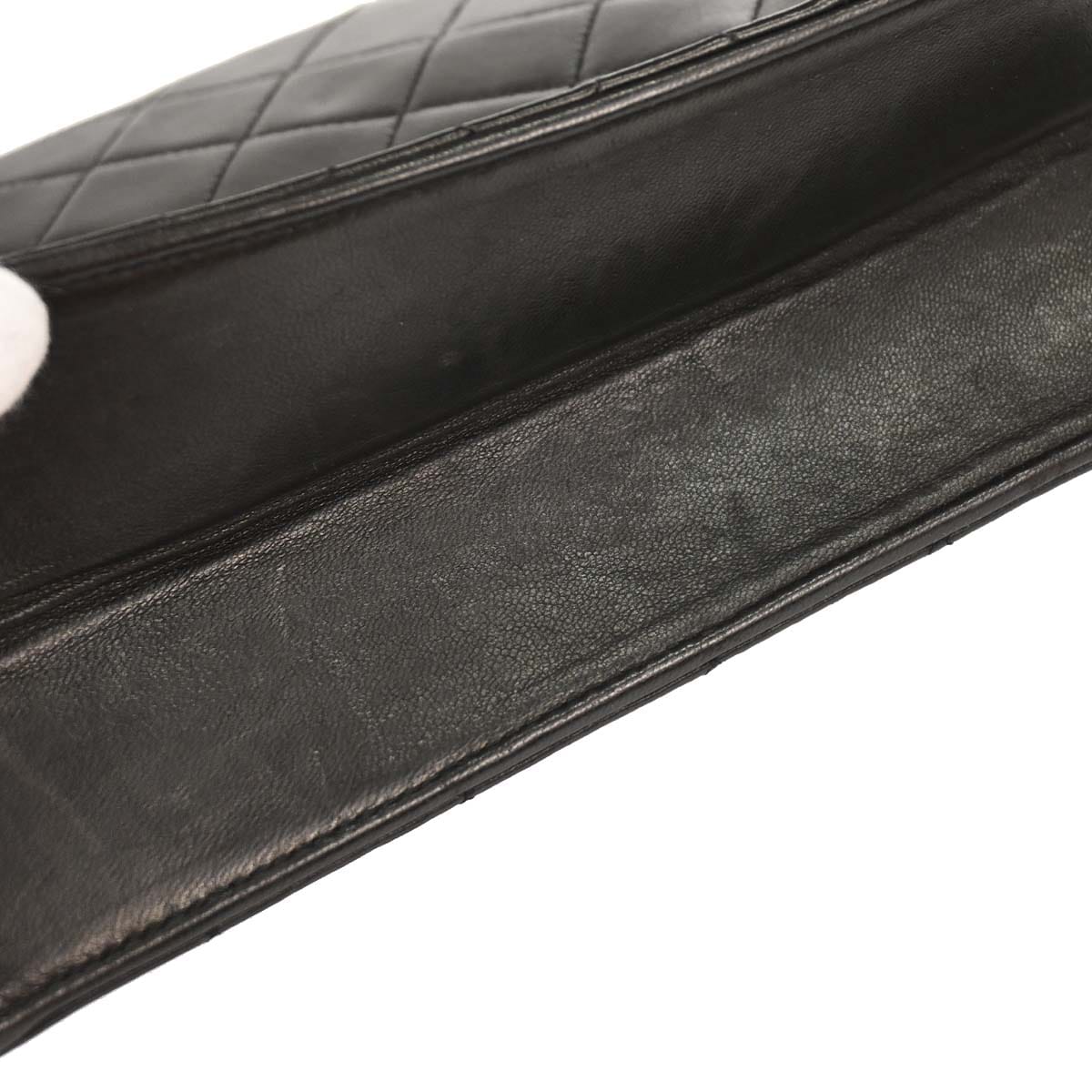 Chanel 1994 - 1996 Black Lambskin Pushlock Small Half Flap Shoulder Bag