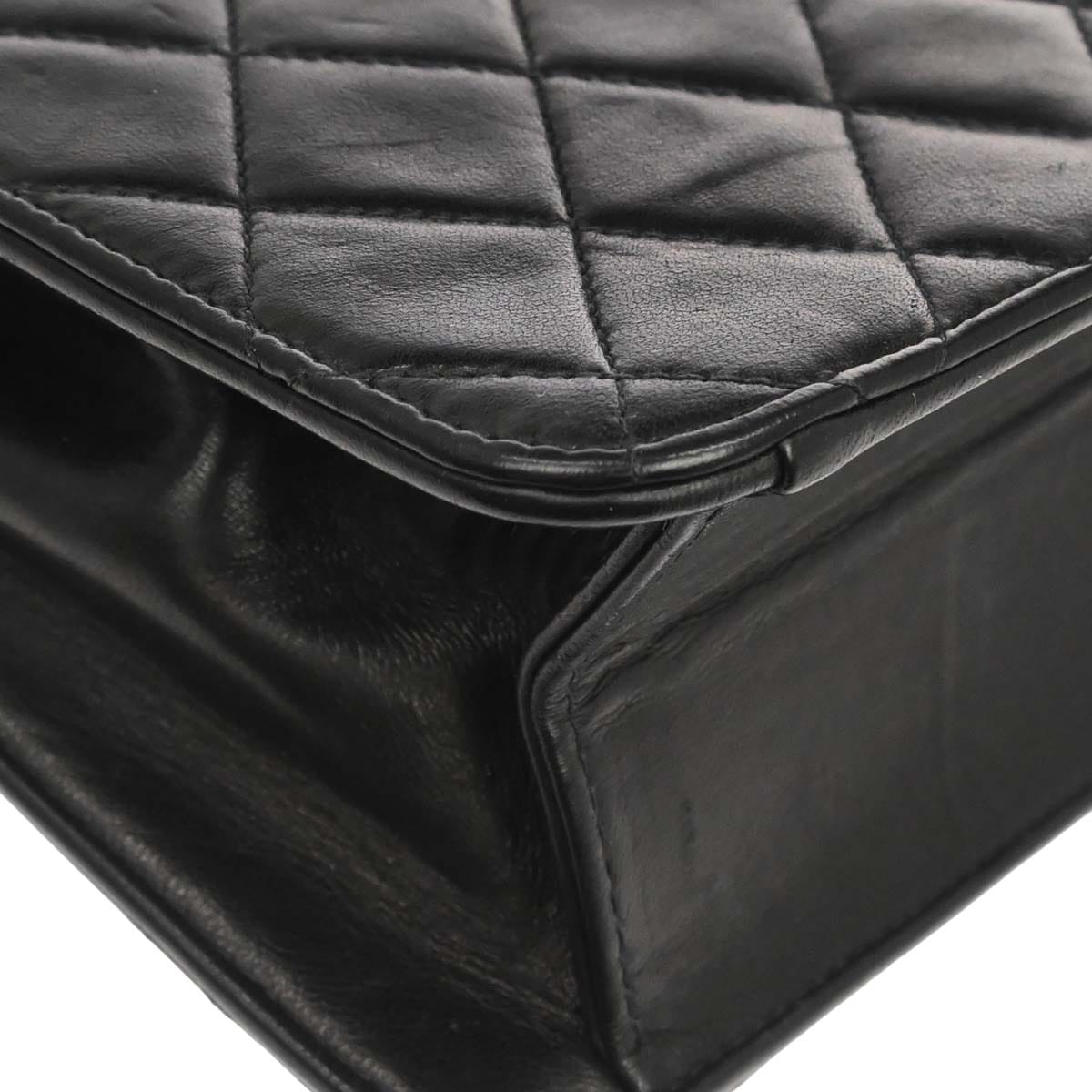 Chanel 1996 - 1997 Black Lambskin Pushlock Medium Half Flap Shoulder Bag