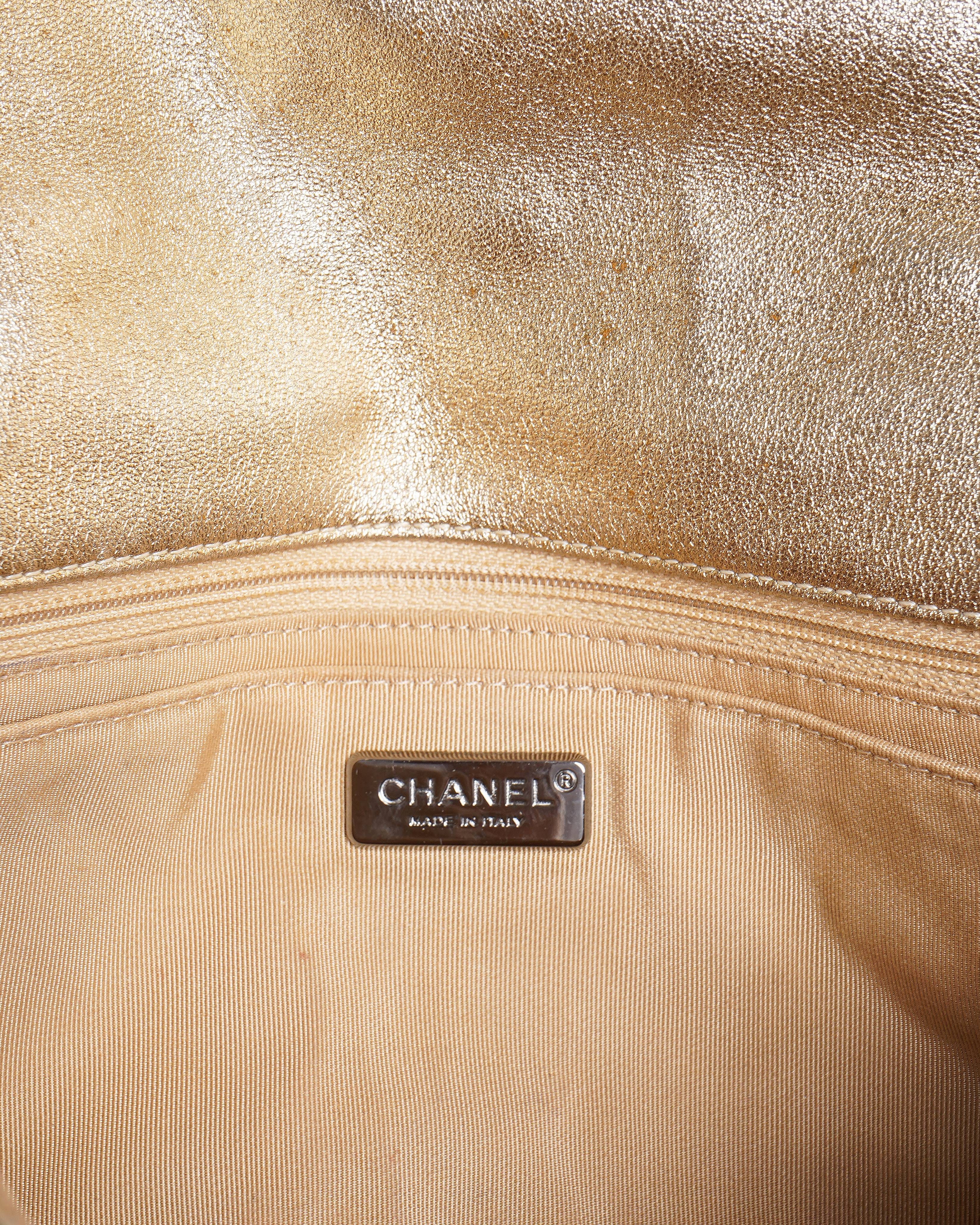Chanel paris dubai perforated metallic lambskin medals flap shoulder bag in gold