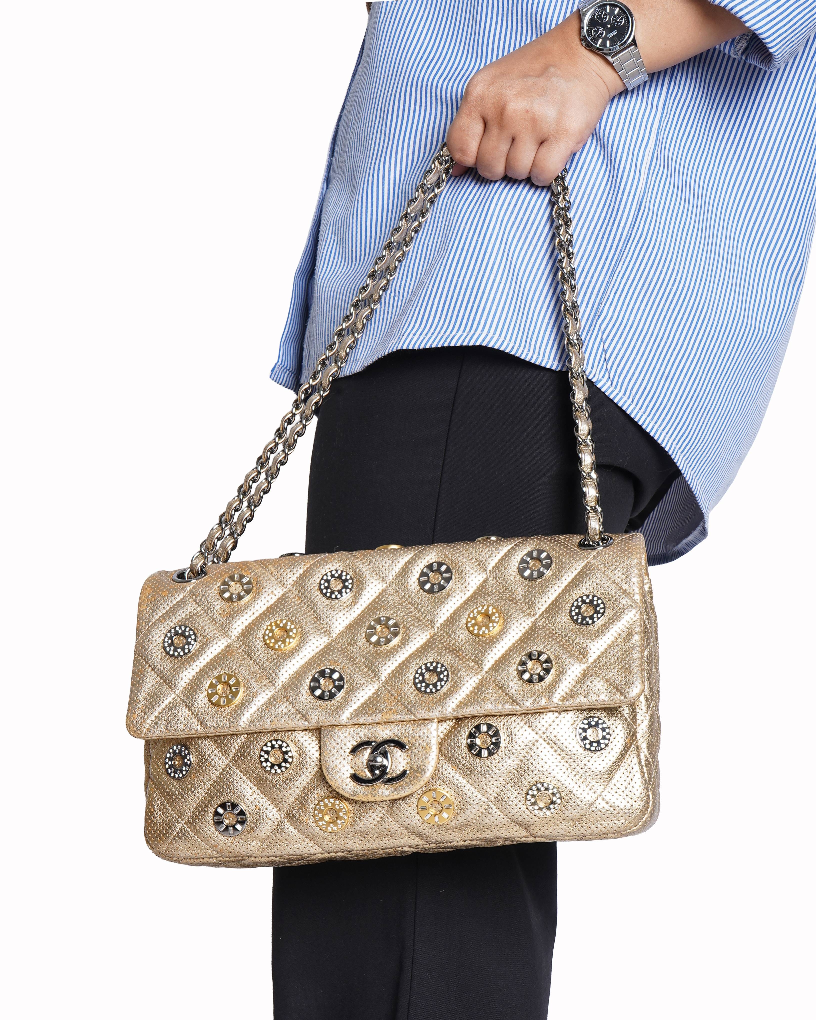 Chanel paris dubai perforated metallic lambskin medals flap shoulder bag in gold