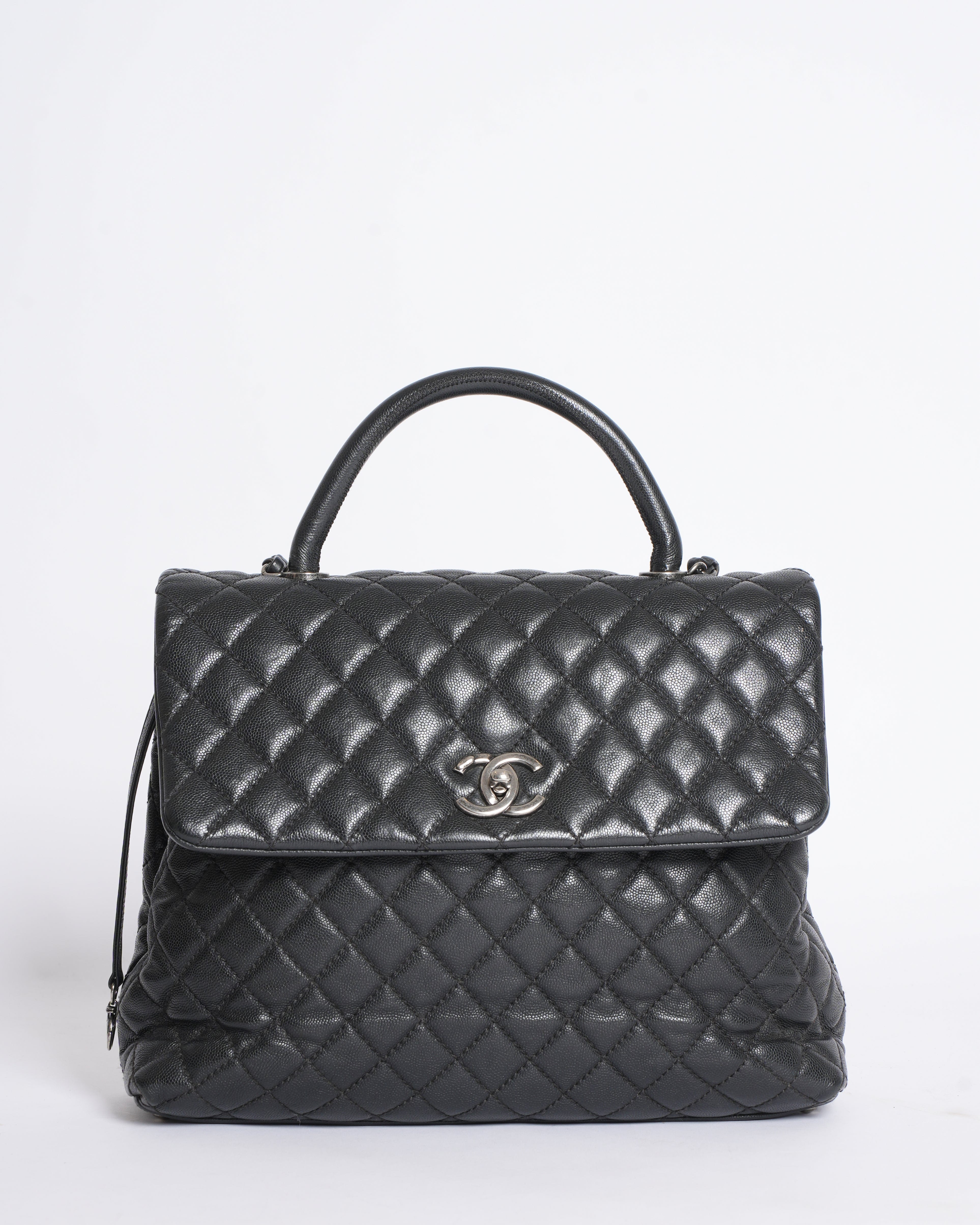 Chanel Quilted Caviar Coco Handle Bag in Black
