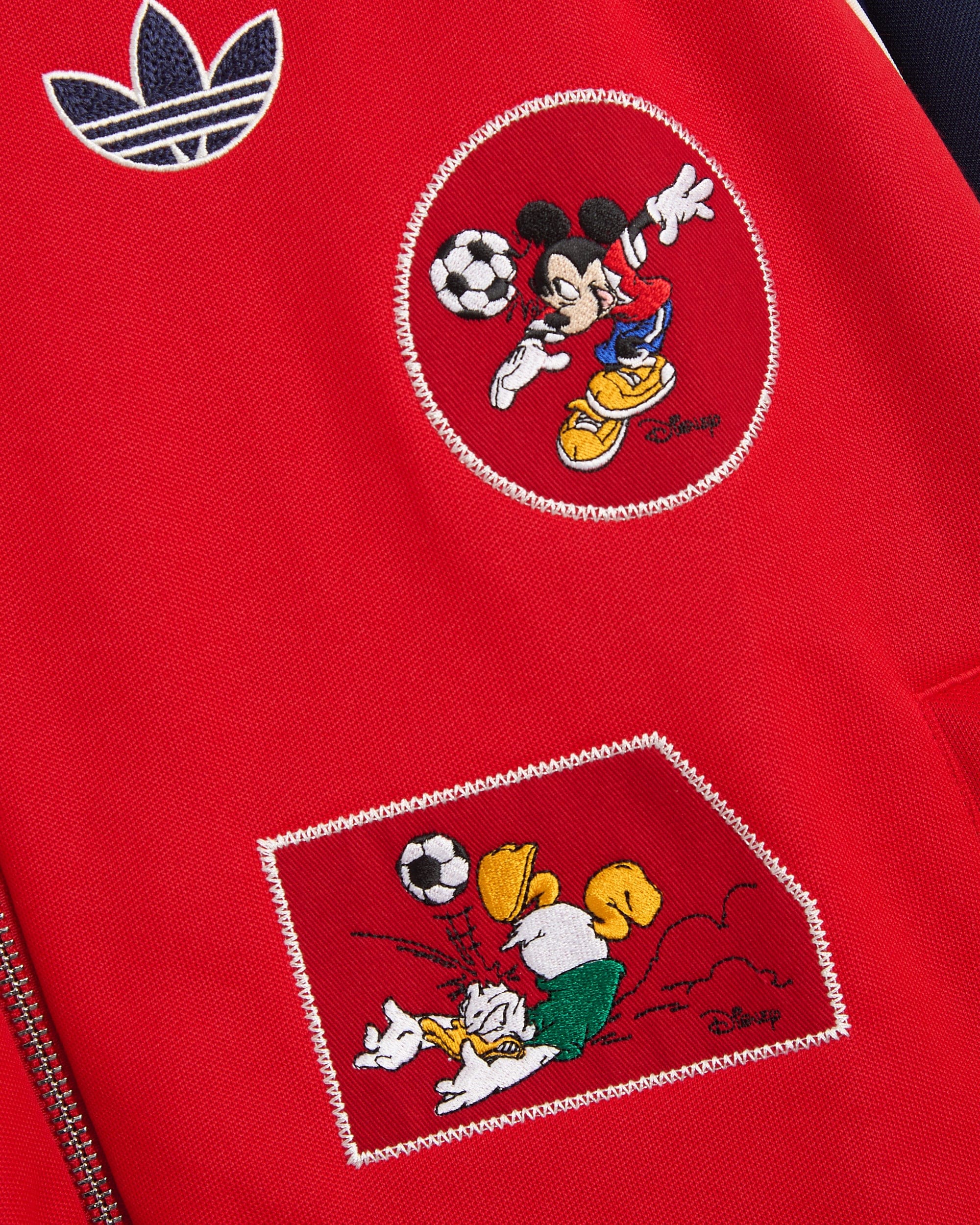 adidas Sudadera con cremallera con parches adidas Originals x Brain Dead x Disney para hombre
