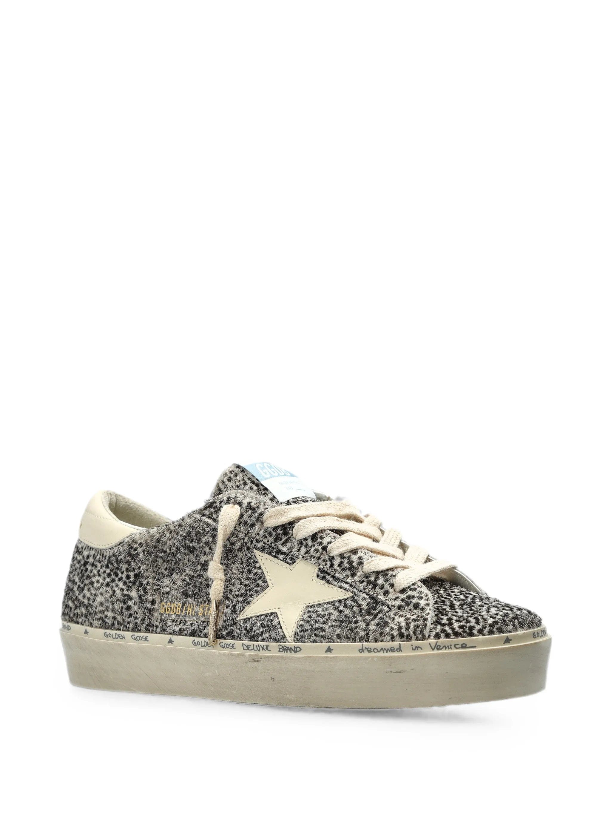 Golden Goose Hi Star in black and white pony skin with white leather star sneakers