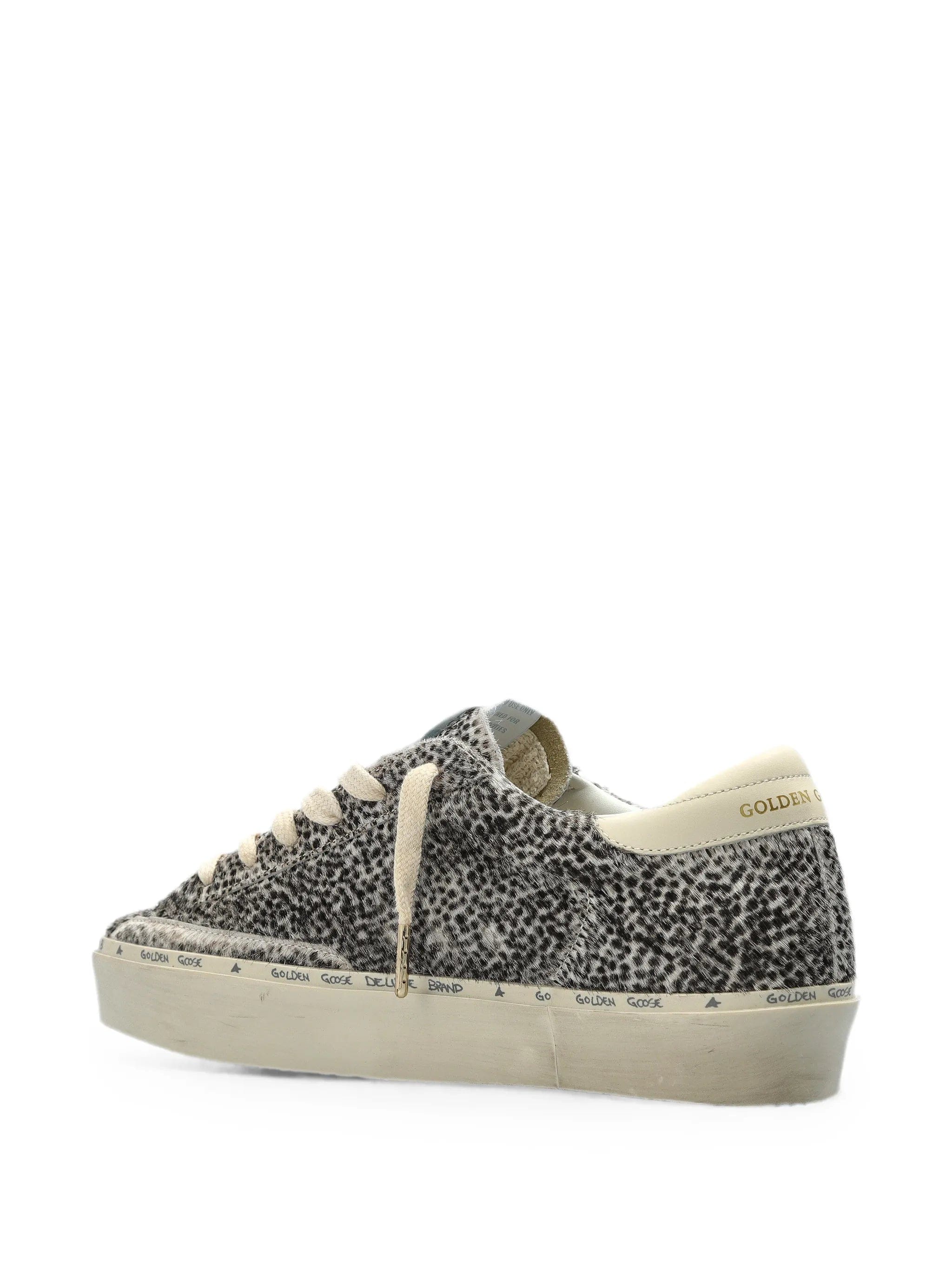 Golden Goose Hi Star in black and white pony skin with white leather star sneakers