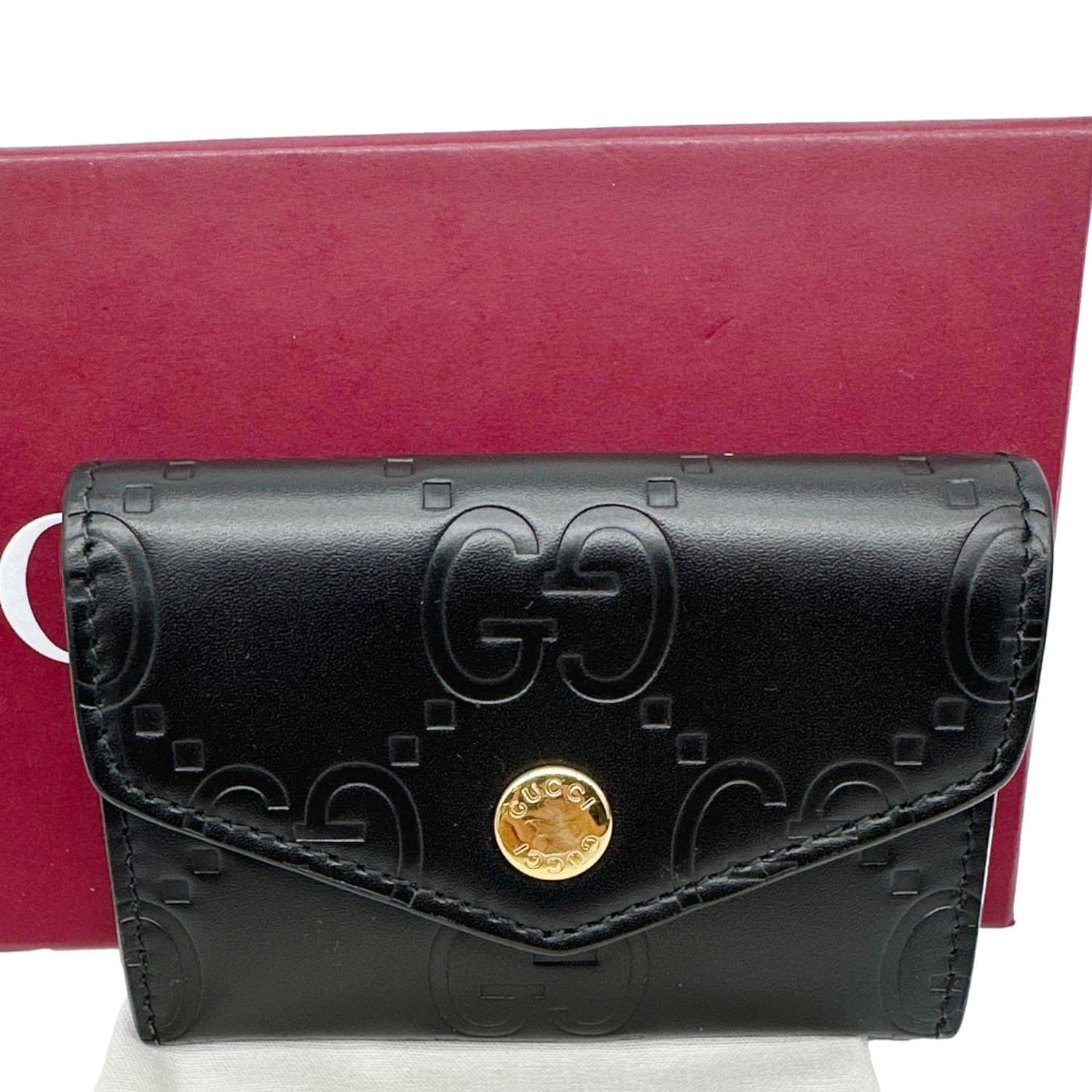 GUCCI Snap Gilbert Jumbo GG Calfskin Embossed Leather Wallet Black 772792